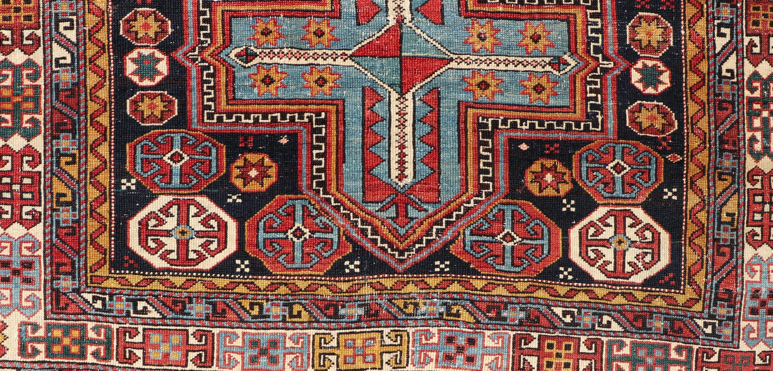 Sqaure antique colorful Kuba Caucasian rug with Cross Medallions. Keivan Woven Arts. Rug R20-0818, country of origin / type: Caucuses / Kuba, circa late-19th century.
Measures: 3'11 x 4'8
This wonderfully colored Kuba rug from the southern