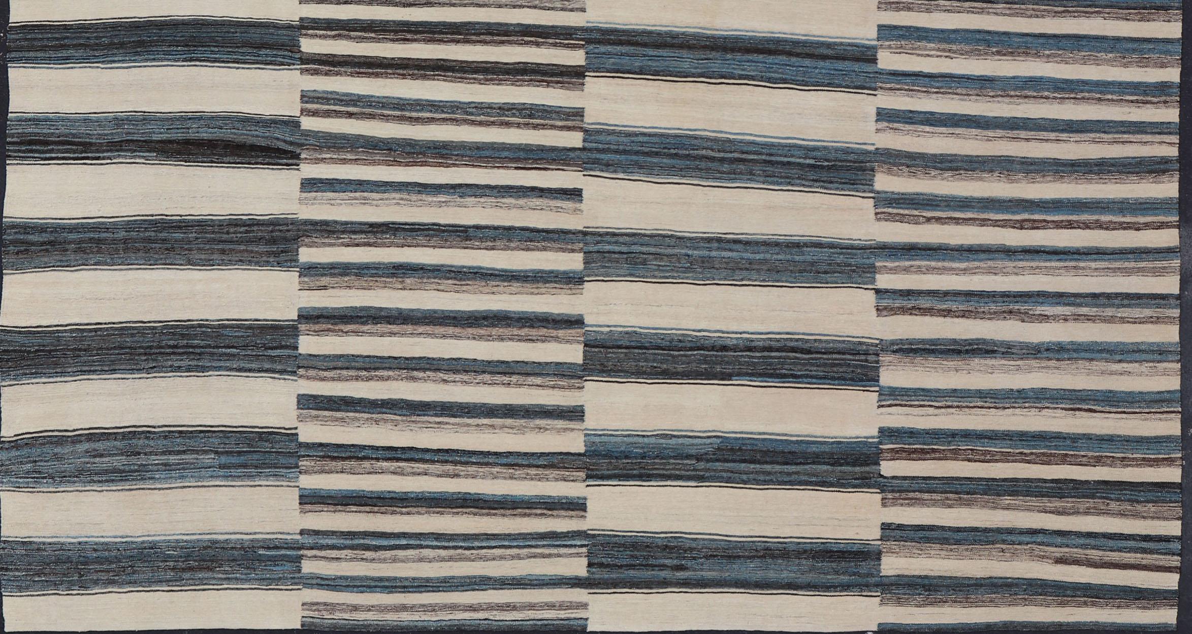 blue and cream striped rug