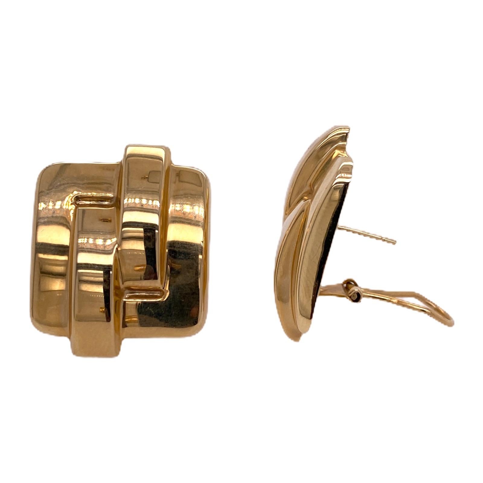 Vintage square light weight earrings fashioned in 14 karat yellow gold. The earrings feature lever backs and measure 1.0 inch in length and 1.0 inch in width. 