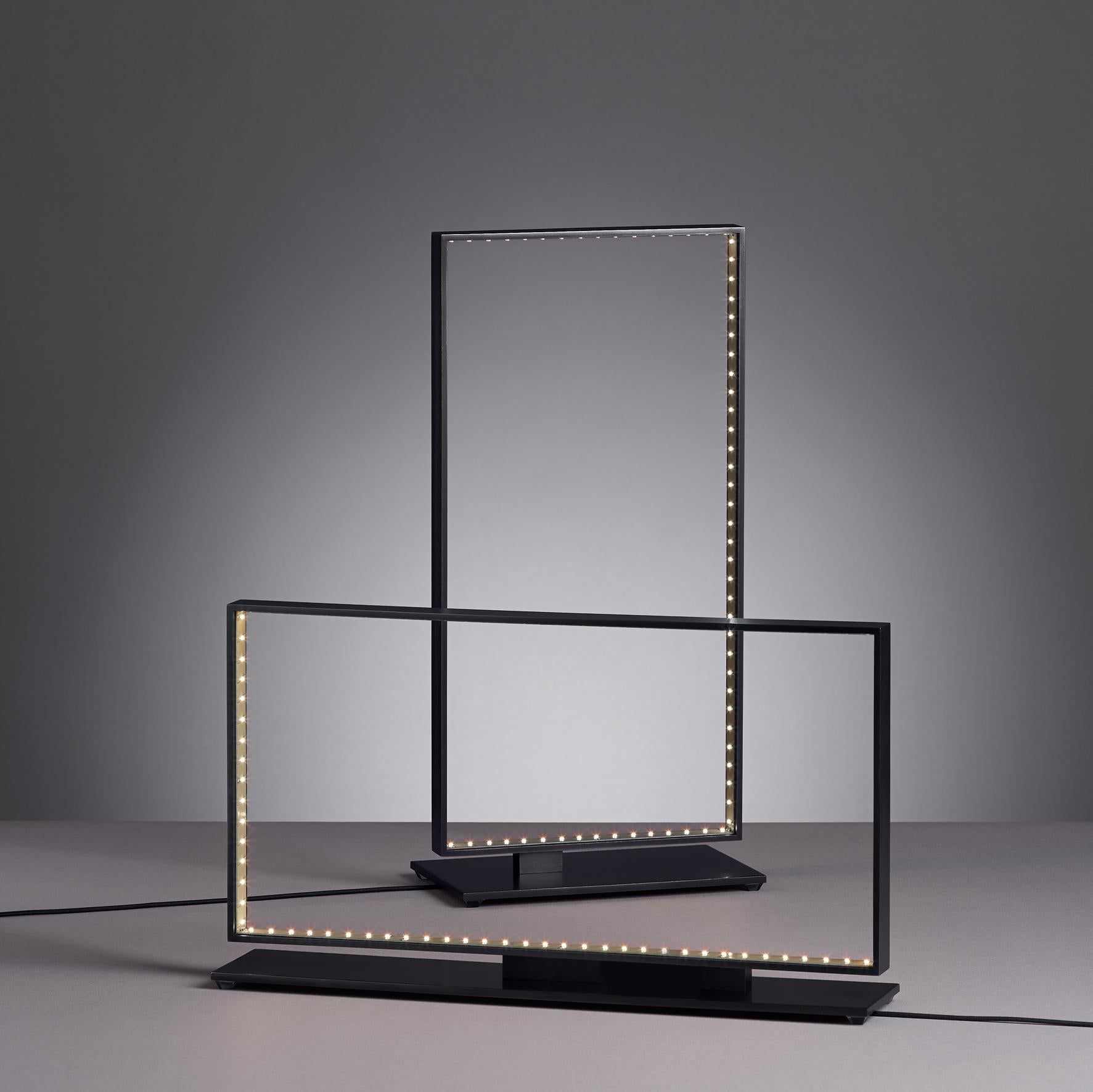 Square 40/20 Table Lamp by Le Deun Luminaires
Dimensions: Square 40: W 41 x D 8 x H 24 cm. Square 20: W 21 x D 10 x H 43 cm
Materials: Epoxy painted steel.

They are a French company established in 1997, specializing in designing and manufacturing