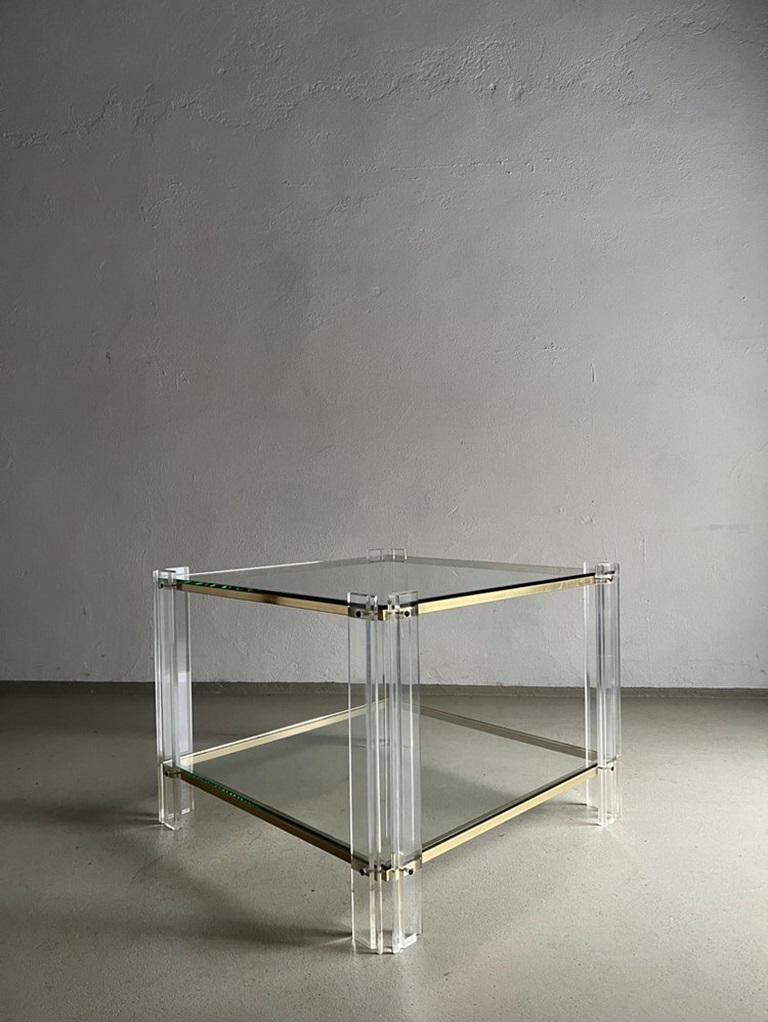 Vintage coffee table - glass surfaces with brass and acrylic glass details.

Additional information:
Country of manufacture: Italy
Period: 1970s
Dimensions: 63 W x 63 D x  48 H cm
Condition: Good vintage condition with some signs of use