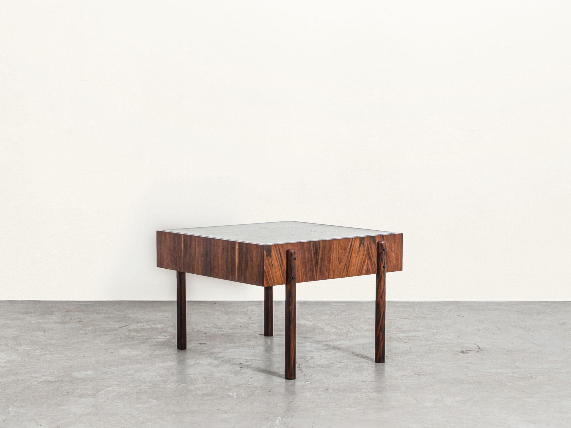 The square Adi table is a 60's-inspired side table and it was started to be produced in 2019. 

The simple lines from the minimalistic design combined with the roughness of the materials together bring a very special quality to the piece, that