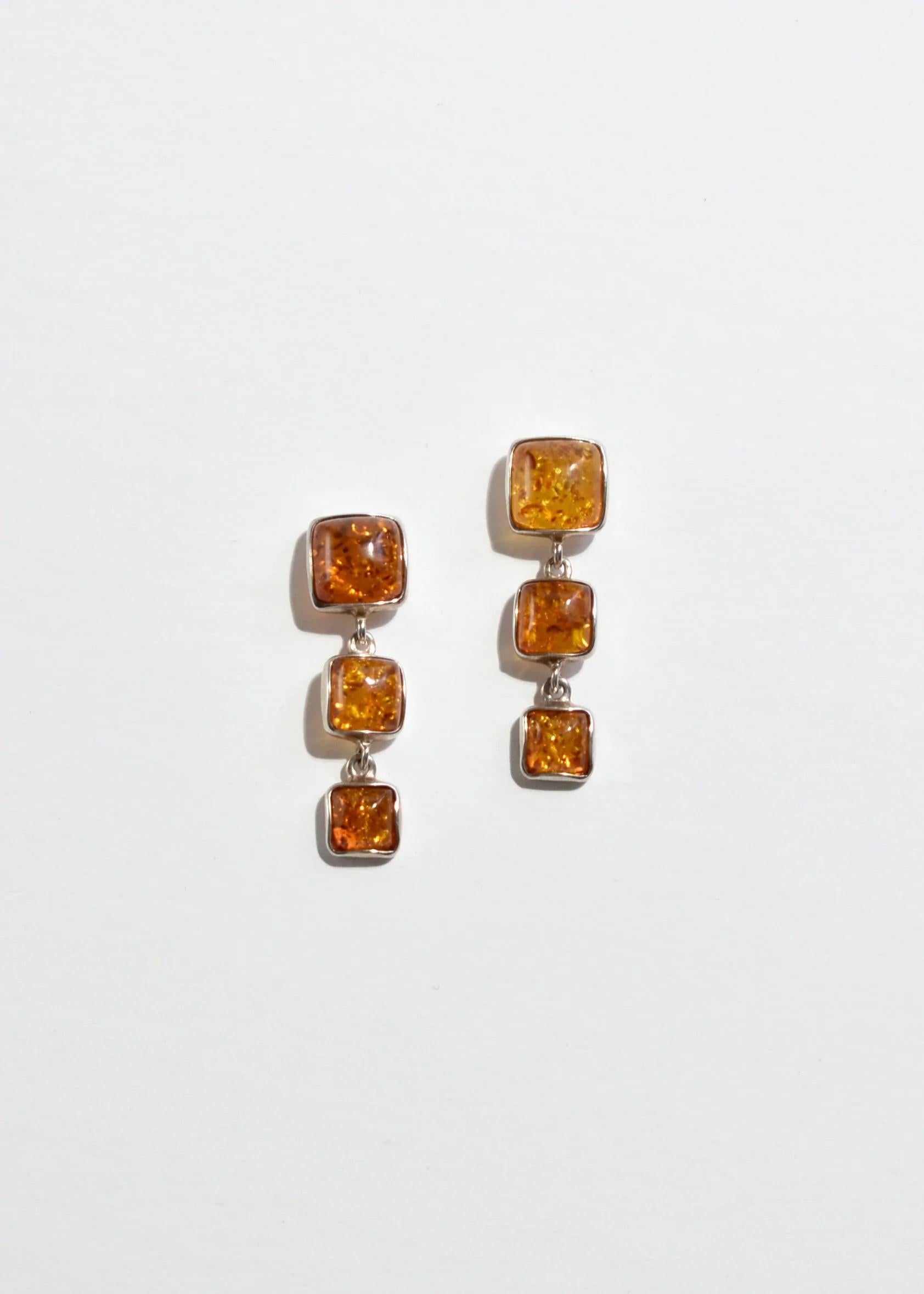 Stunning vintage amber earrings with square shapes and a drop detail, pierced.

Material: Sterling silver, amber. 