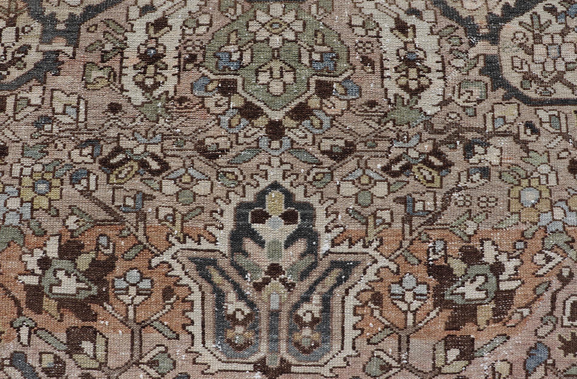 Square Antique Persian Bakhtiari Rug with Large Ornate Central Medallion Design. Keivan Woven Arts / Rug/W22-0206, antique Bakhtiari Mid-20th Century Origin / Iran 
Measures: 12'4 x 12'6 
This multicolored Persian Bakhtiari rug features a central