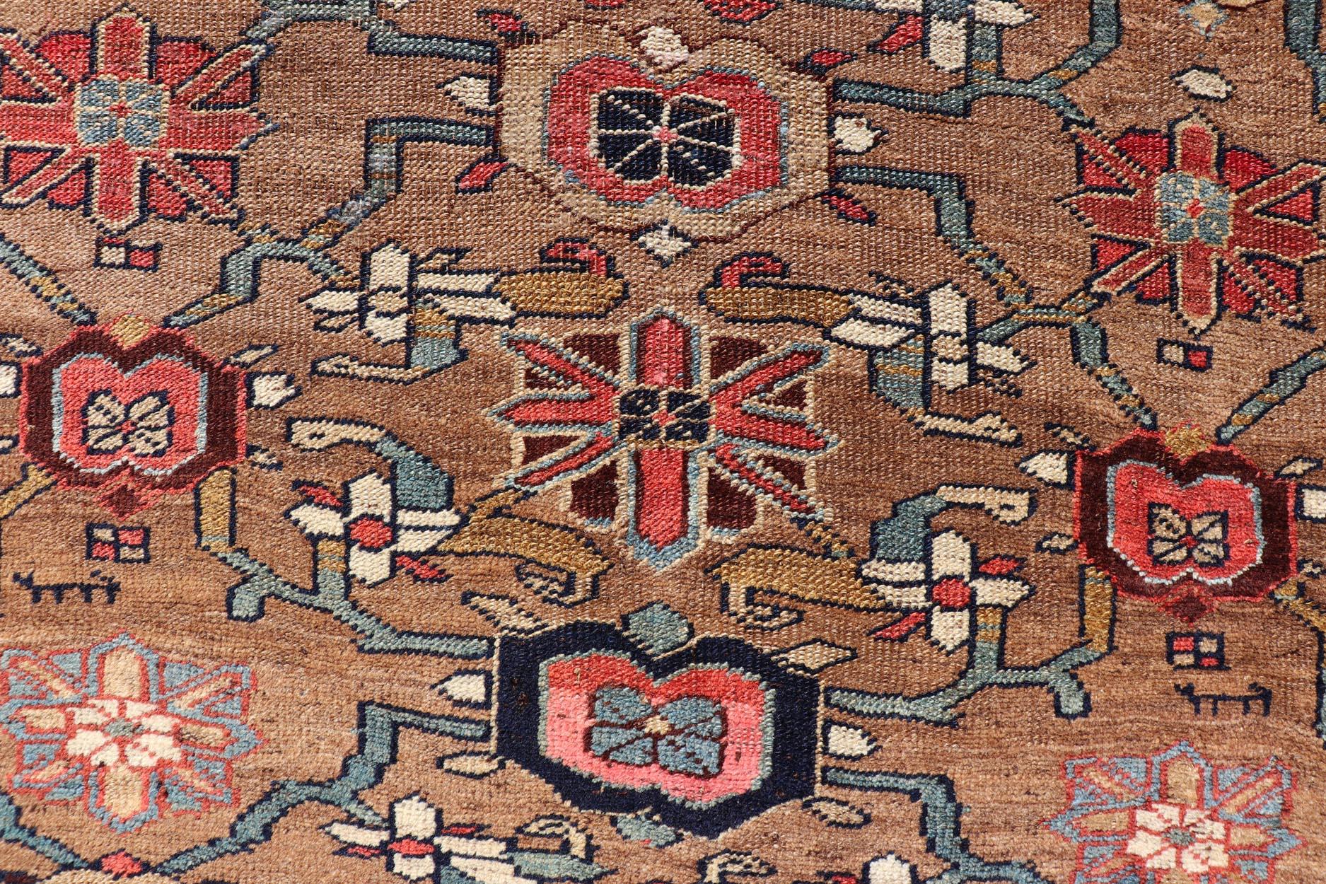 Square Antique Persian Bidjar Rug with Floral Motifs in Brown, Tan, & Green. EMB-22118-15010, country of origin / type: Iran / Bidjar, circa 1900
Measures: 4'6 x 4'11.
This antique Persian Bidjar carpet features multi colors and a a large florals,