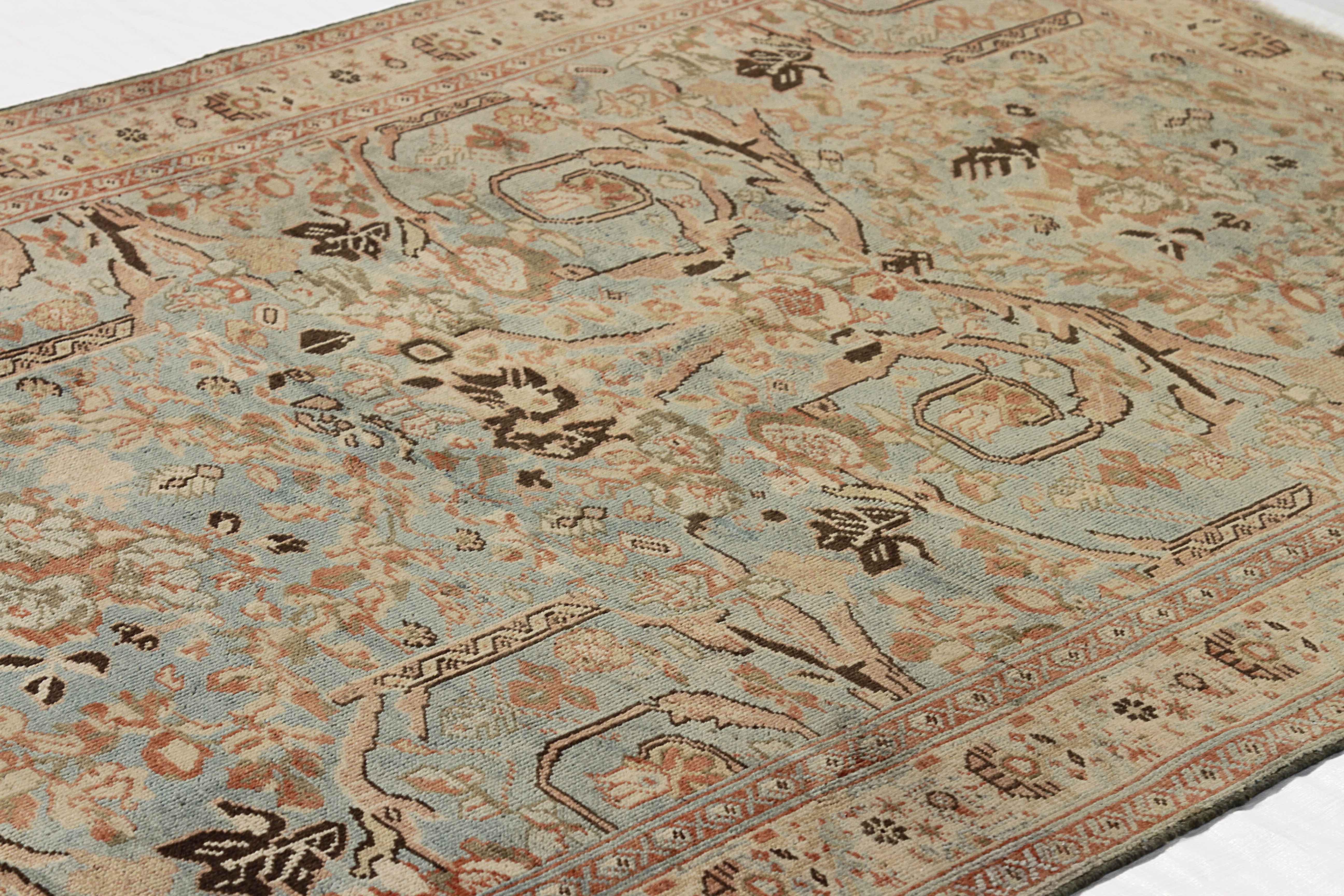 Antiker persischer Sultanabad-Teppich aus der Area mit floralen Details auf braunem und blauem Feld (Persisch) im Angebot