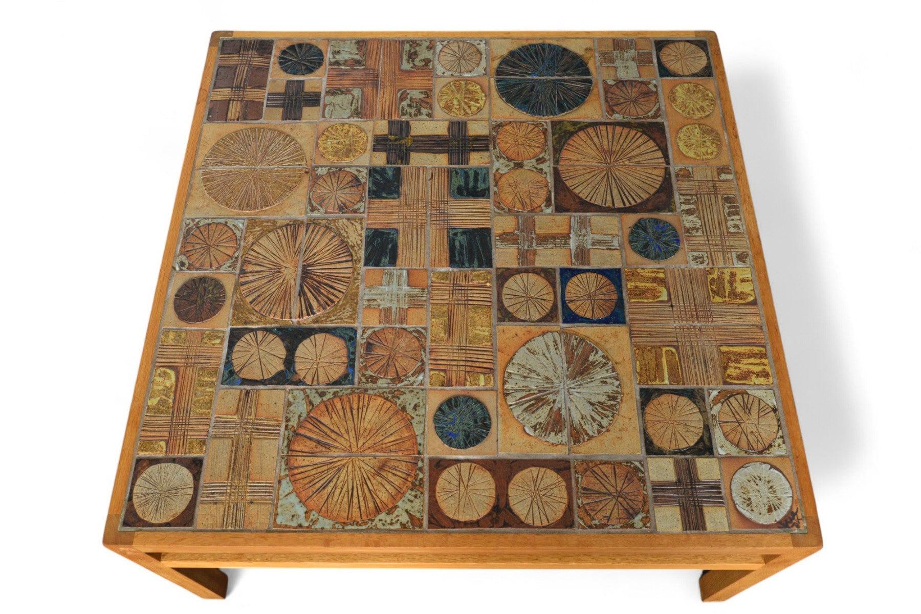 Origin: Denmark
Designer: Tue Poulsen
Manufacturer: Tue Poulsen
Era: 1960s
Materials: Ceramic Tile, Oak
Measurements: 40″ wide x 40″ deep x 20″ tall