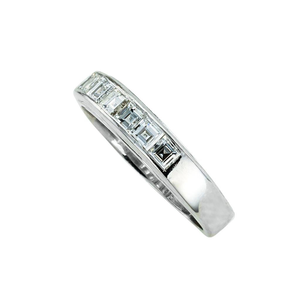 Square baguette diamonds and platinum ring band. *

ABOUT THIS ITEM:  #R-DJ48H. Scroll down for detailed specifications.  The seven bright diamonds have been carefully matched for cut, color, and clarity, and they have been graded within the white