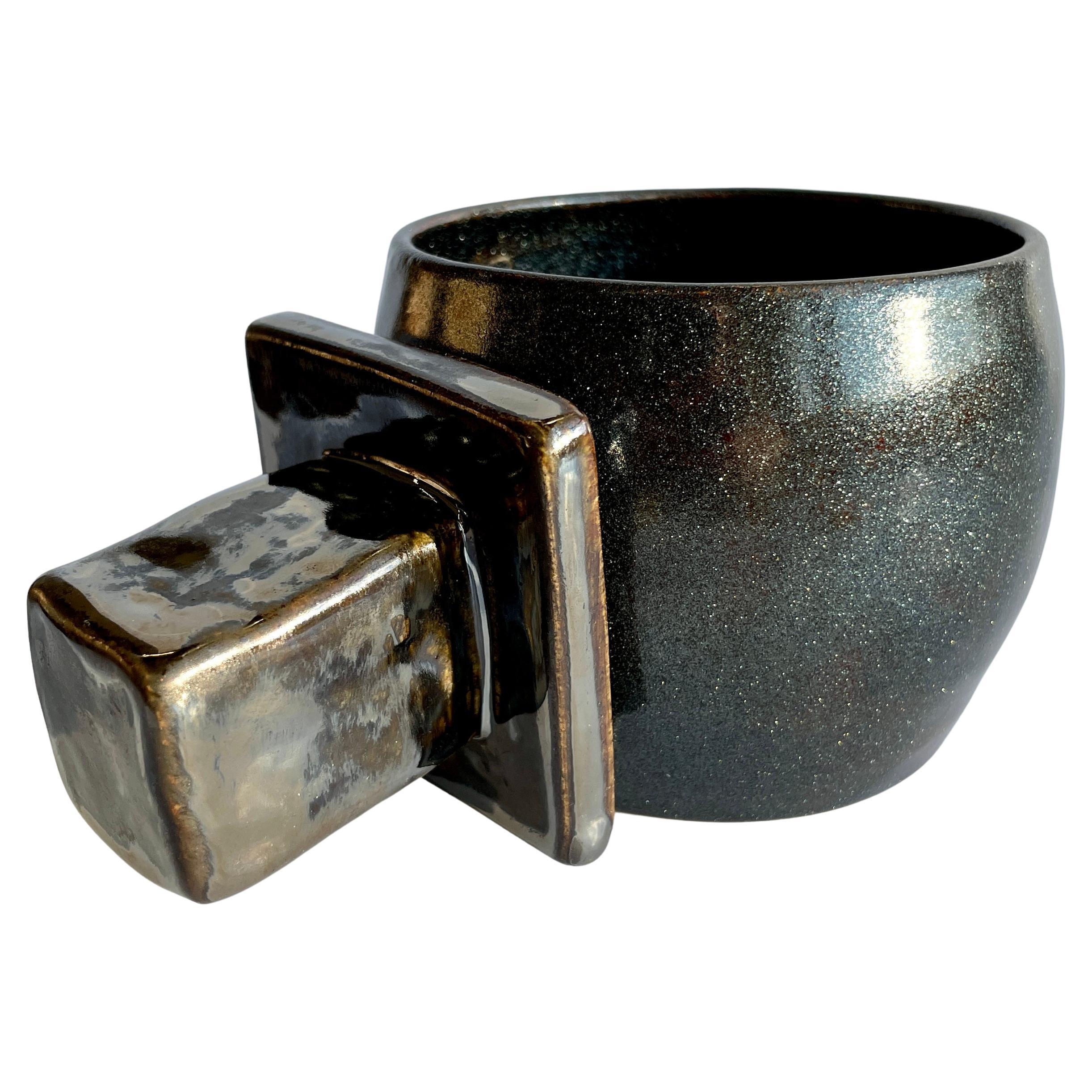 The Square BIB Orbital, shown here in Galaxy and Broken Silver, the food safe vessel for your favorite beverage of choice, entertaining, or as a decorative object or objet d'art. Versatile, sustainable and one of kind, made of recycled stoneware and