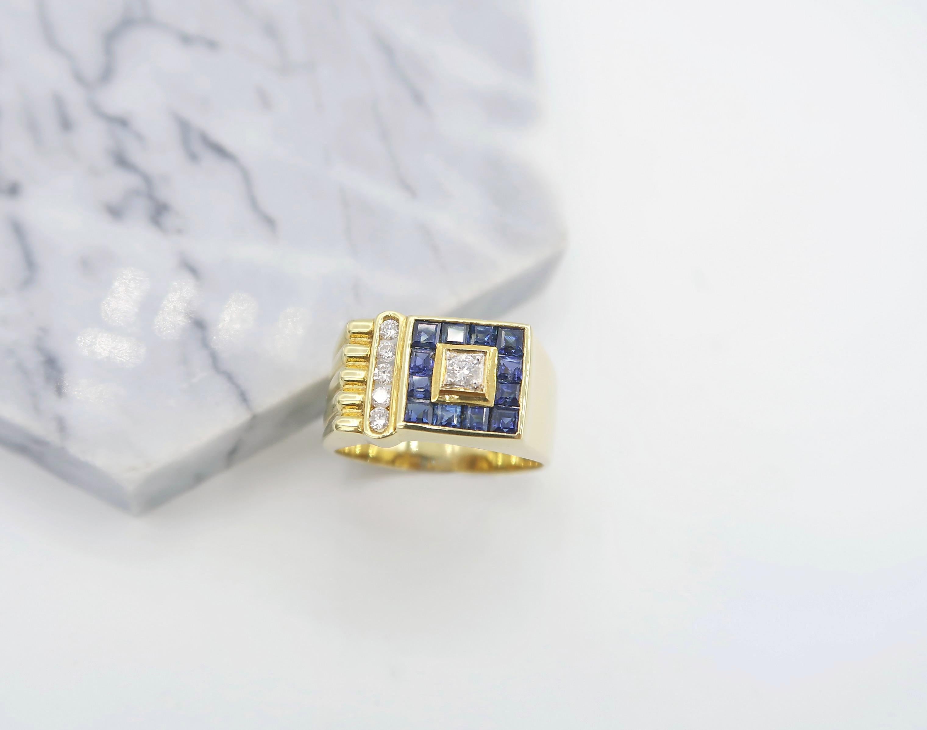 Square Blue Sapphire Diamond Channel-Set Fluted 18K Yellow Gold Men's Ring

Gold: 18K Yellow Gold, 8.13 g
Sapphire: 2.94 ct
Diamond: 0.34 ct

Ring size: US 8 1/2, UK Q 3/4, 58 1/2

Please let us know should you wish to have the ring resized or