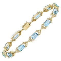 Pulsera de eslabones cuadrada estilo Art Déco de oro amarillo de 14 quilates con topacio azul y diamantes