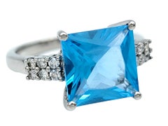 Square Blue Topaz and Pavé Diamond Cocktail Ring Set in 14 Karat White Gold