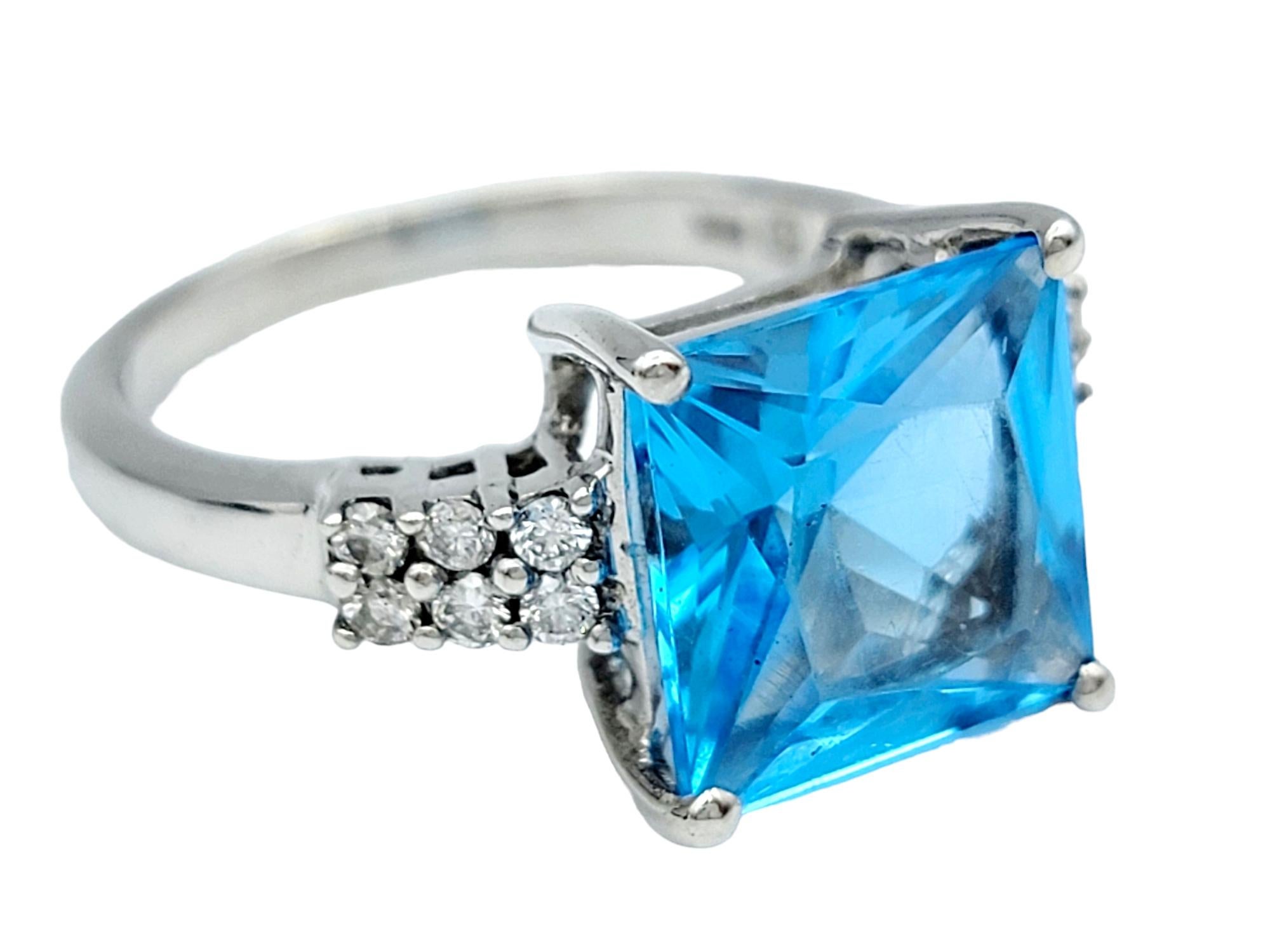 Contemporary Square Blue Topaz and Pavé Diamond Cocktail Ring Set in 14 Karat White Gold For Sale