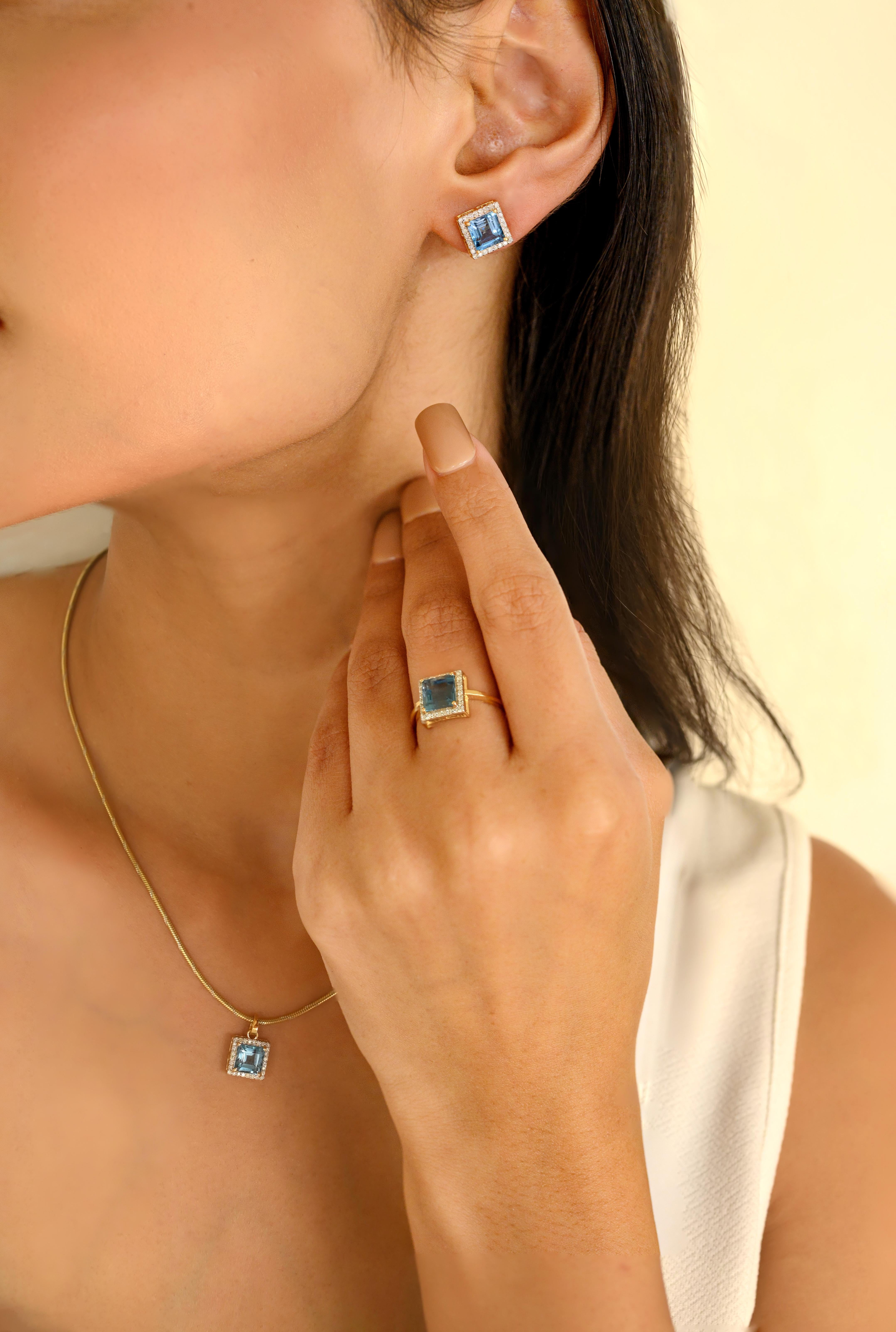 Quadratischer Blautopas-Diamant-Halo-Ohrring-Anhänger aus 18 Karat Gold, besetzt mit quadratischem Blautopas und Diamanten mit rundem Schliff. Dieses atemberaubende Schmuckstück wertet einen Freizeitlook oder ein elegantes Outfit sofort auf.