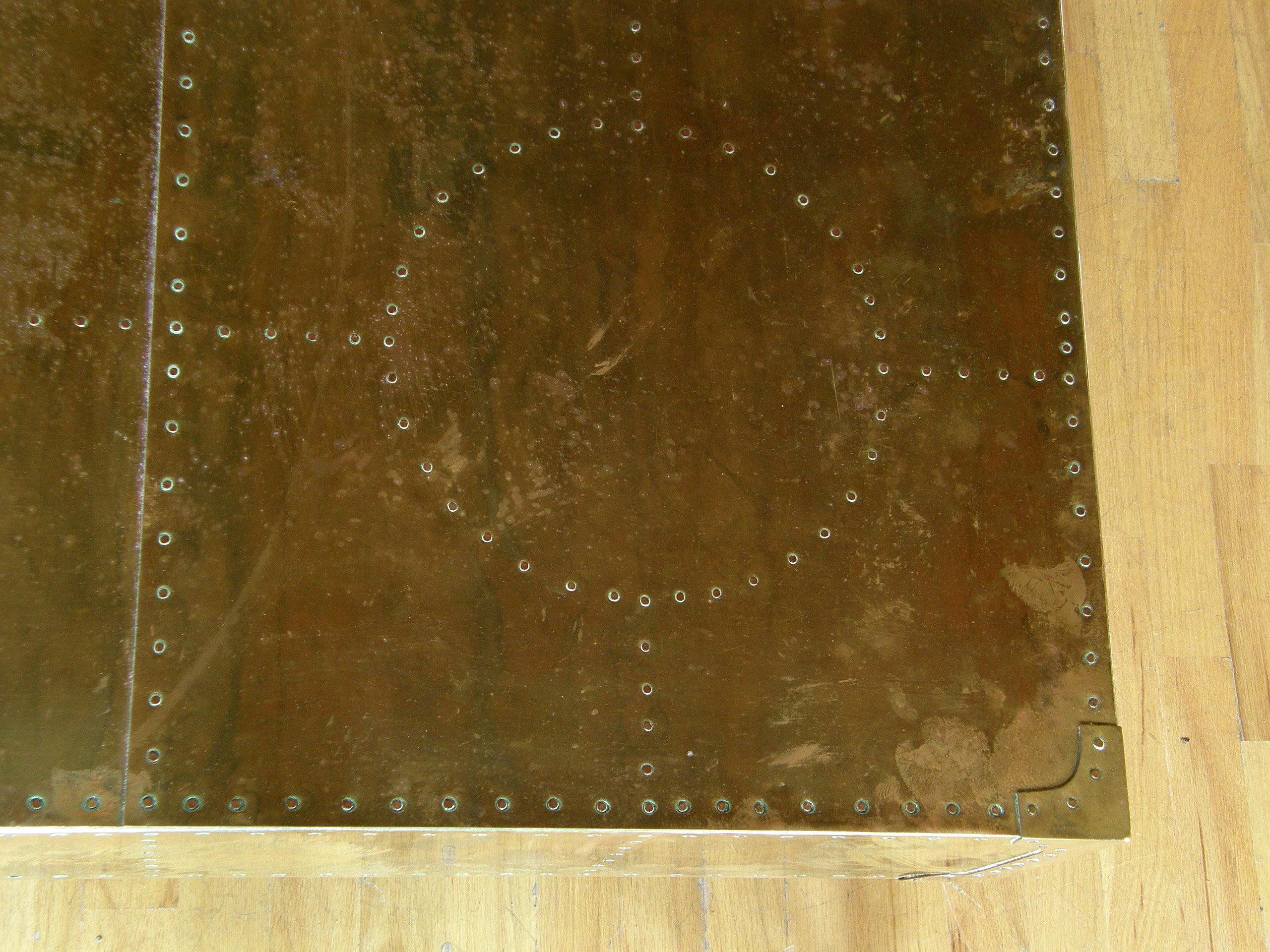 Late 20th Century Square Brass Clad and Riveted Coffee Table on Plinth Base Attributed to Sarreid