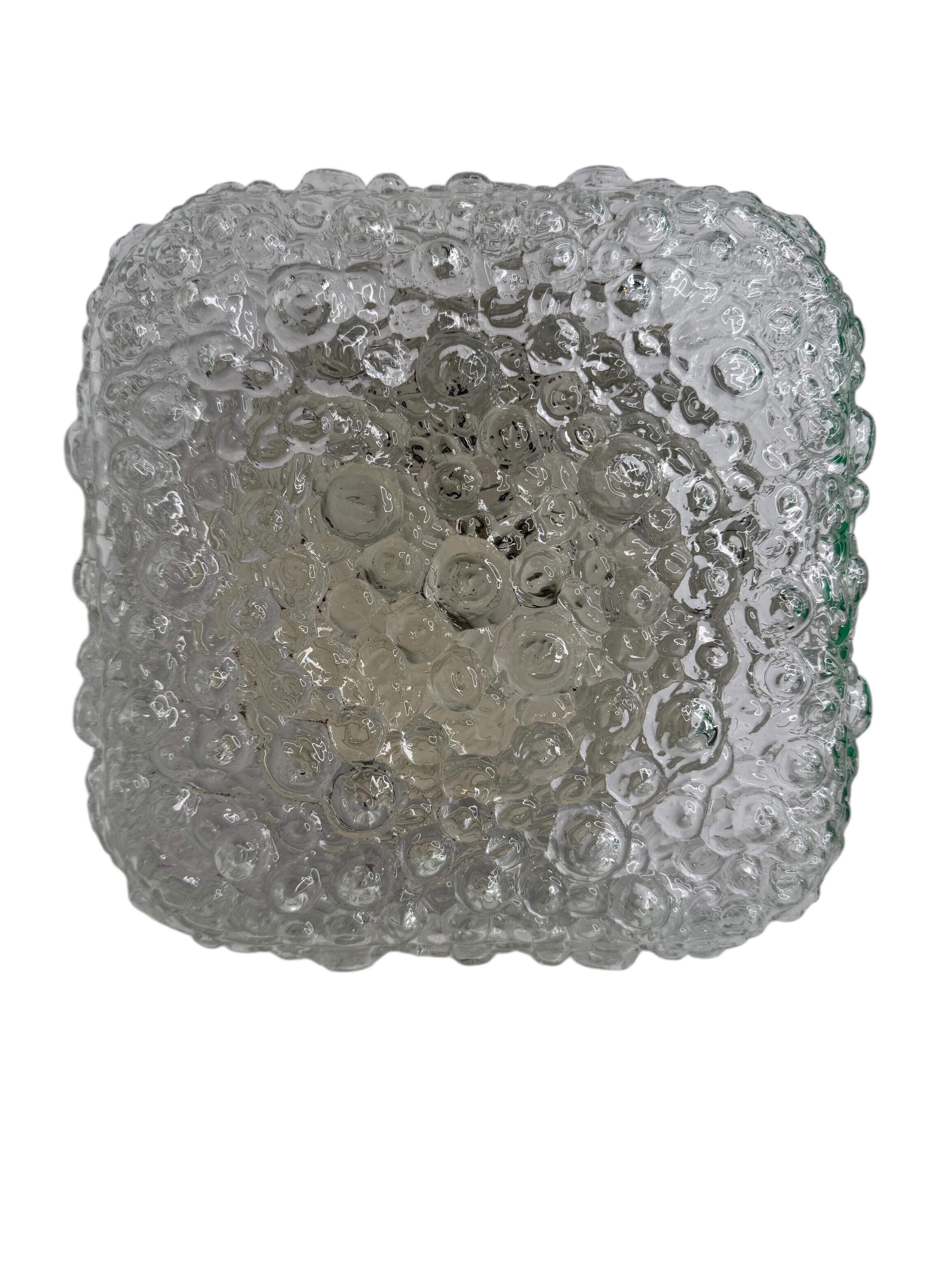 Petite glass flush mount. Made in Germany attributed to Glashütte Limburg. Gorgeous textured glass flush mount with metal fixture. The fixture requires one European E27 / 110 Volt Edison or Medium bulb up to 75 watts. Found at an Estate Sale in