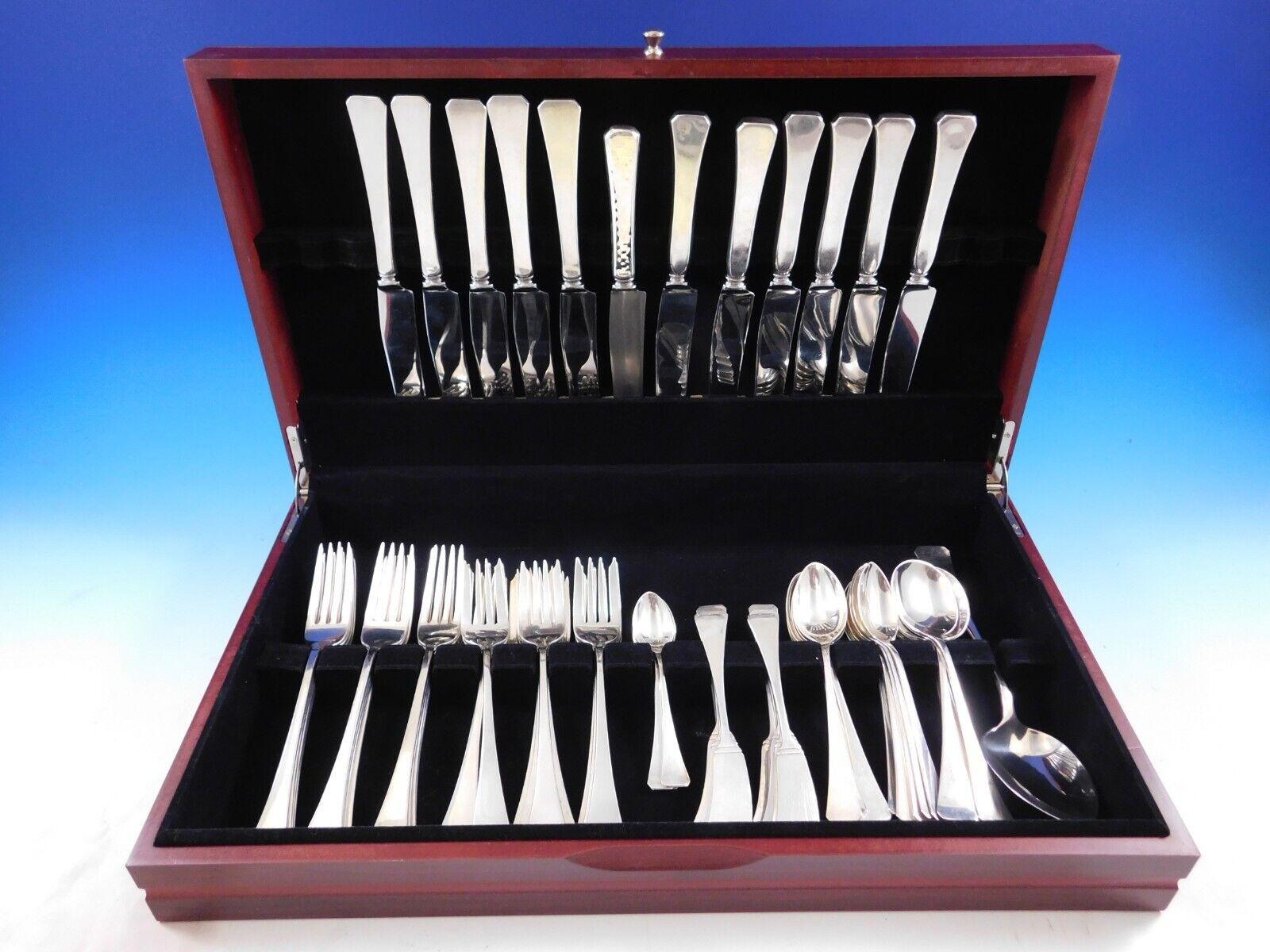 Dinner size square (formerly Cornwallace) by Allan Adler & Blanchard hand-made sterling silver flatware set - 74 pieces. This set has a subtle hand hammered finish and includes:
12 Dinner Knives, 9 1/8