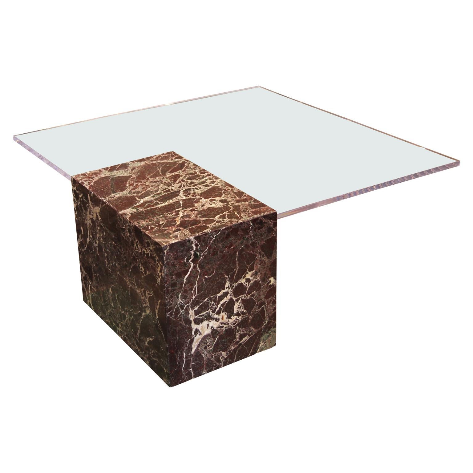A red toned Italian marble with beautiful white veining functions as a base for a floating clear Lucite tabletop. The marble base is vintage and the Lucite top is a contemporary addition, circa 1970s with new Lucite!