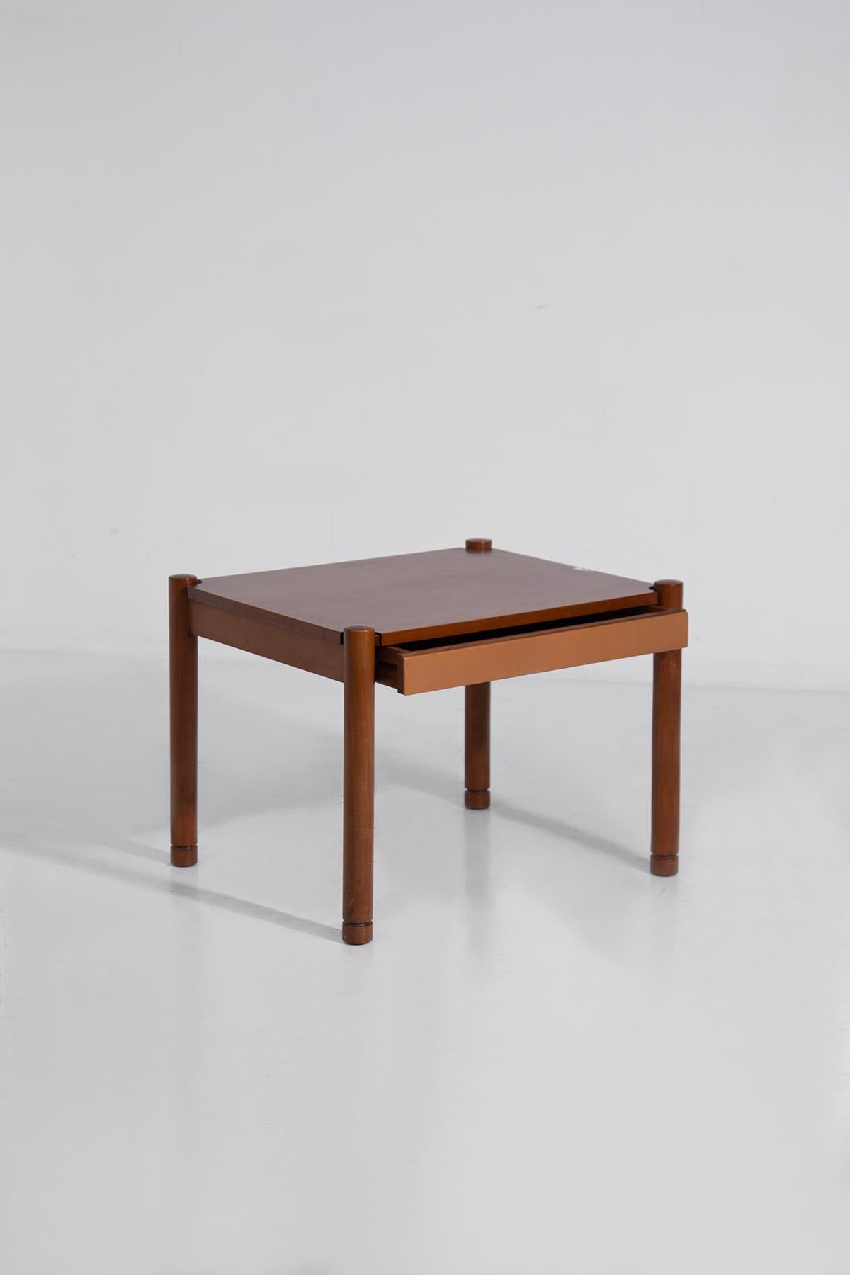 In the world of furniture design, some pieces stand out not only for their functionality but also for their timeless beauty. The Square Coffee Table by Eugenio Gerli For Borsani from the 1950s is one such masterpiece. Crafted with precision and an