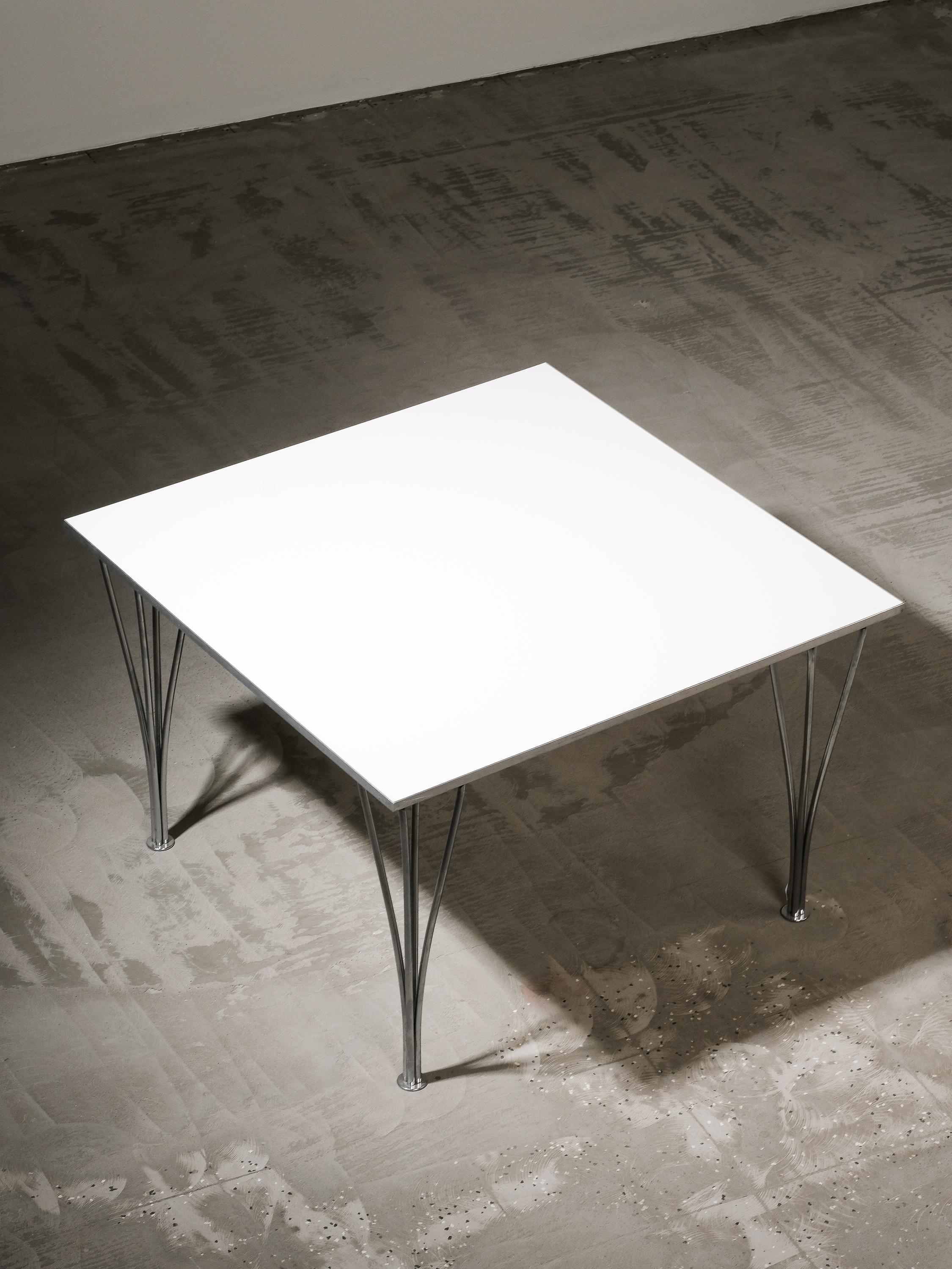 Bruno Mathsson and Piet Hein for Fritz Hansen coffee table, laminated wood, chrome-plated steel, aluminum, Denmark, production 1990.