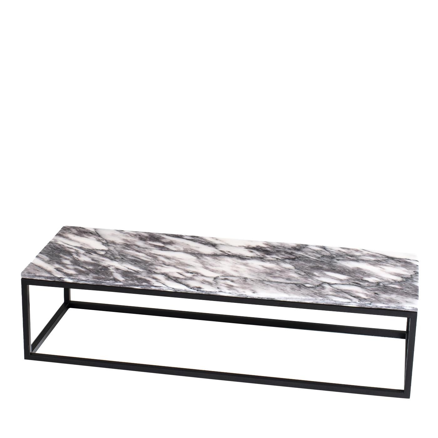 A simple design available in a wide variety of sizes, materials and finishes for endless combinations. Completely personalizable, the chic contemporary coffee table can be topped with glass, marble and more to fit seamlessly with the rest of your