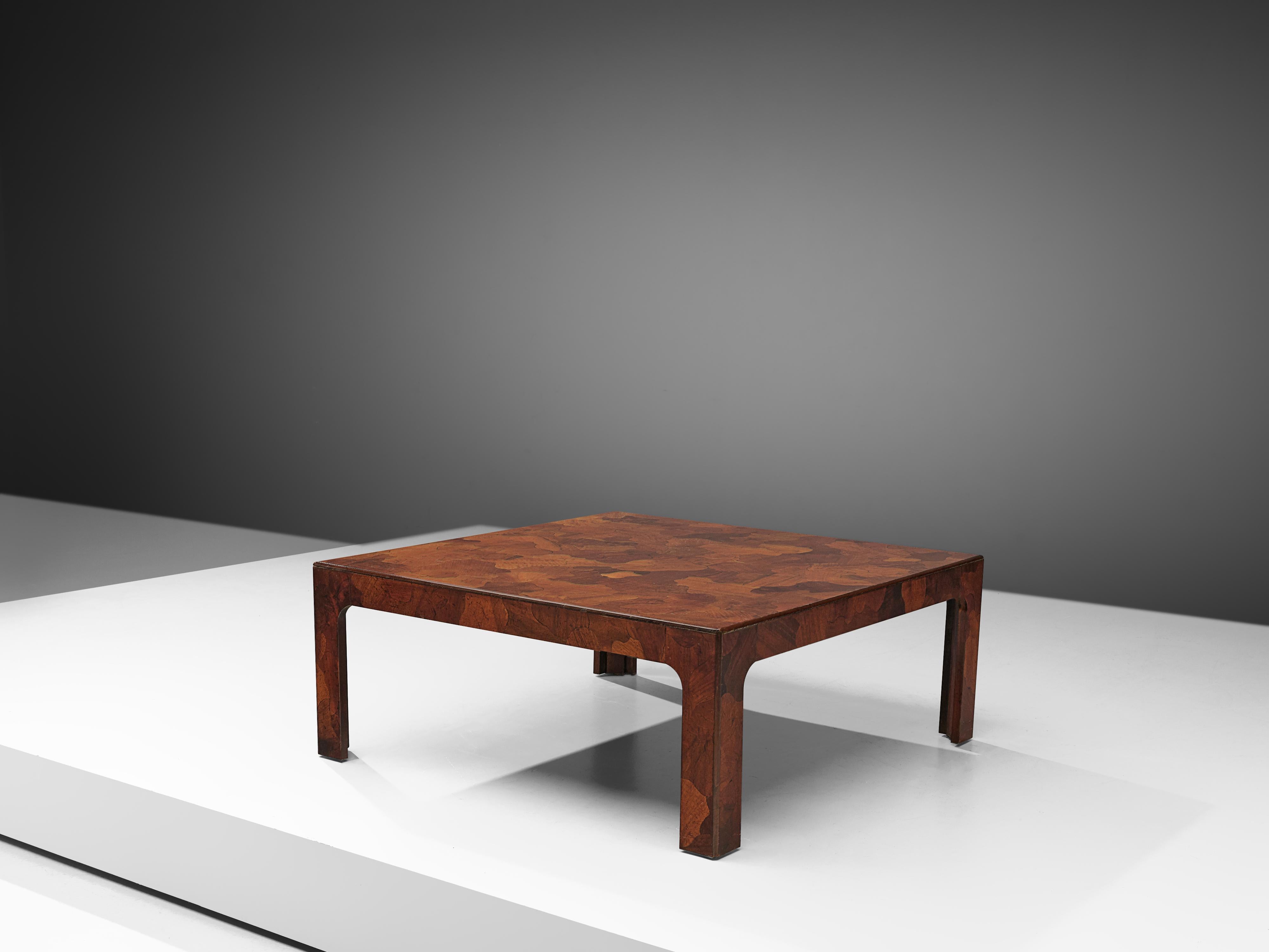 Coffee table, American walnut, United States, 1960s

Well-designed rectangular coffee table inlayed with organic shaped pieces of American walnut that show a variety of tones. Also the four legs feature the same admirable surface design. 
