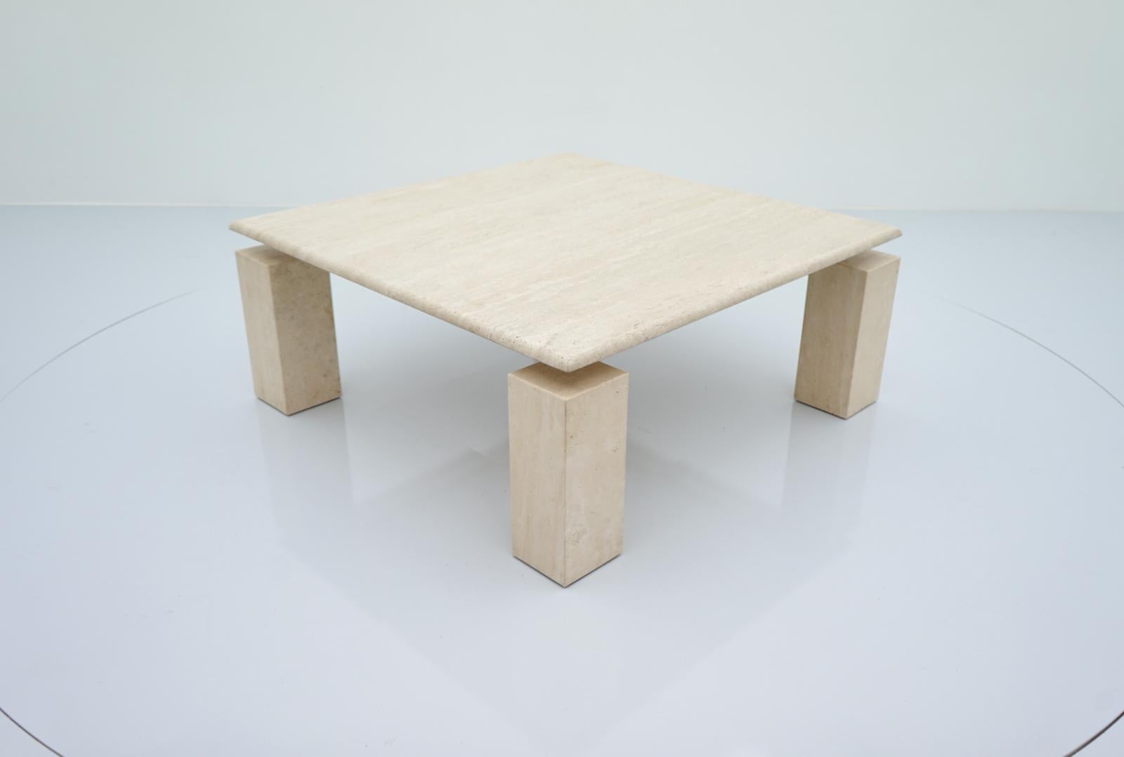 Square Travertine and brass Coffee Table with a floating table top, Italy 1970s. 
Very good condition.
Details

Creator: unknown
Period: 1970s
Color: beige
Style: Mid-Century Modern
Place of Origin: Italy
Dimensions: Height: 16.33 in. (41,5 cm)