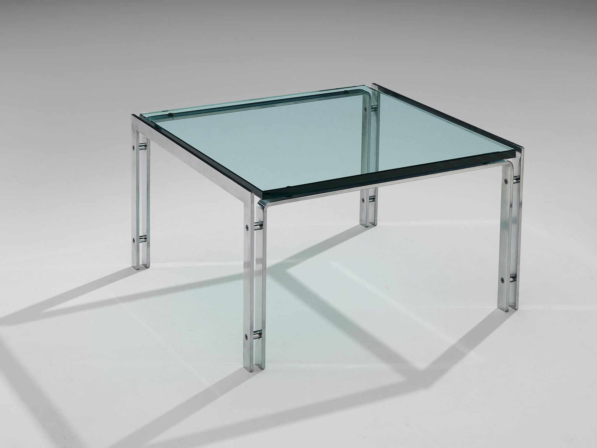 Coffee table, steel and glass, The Netherlands, 1970s

Modernist coffee table in chrome plated steel and glass. This design displays sober and straight forward characteristics due the combination of materials and the design of the legs. The table