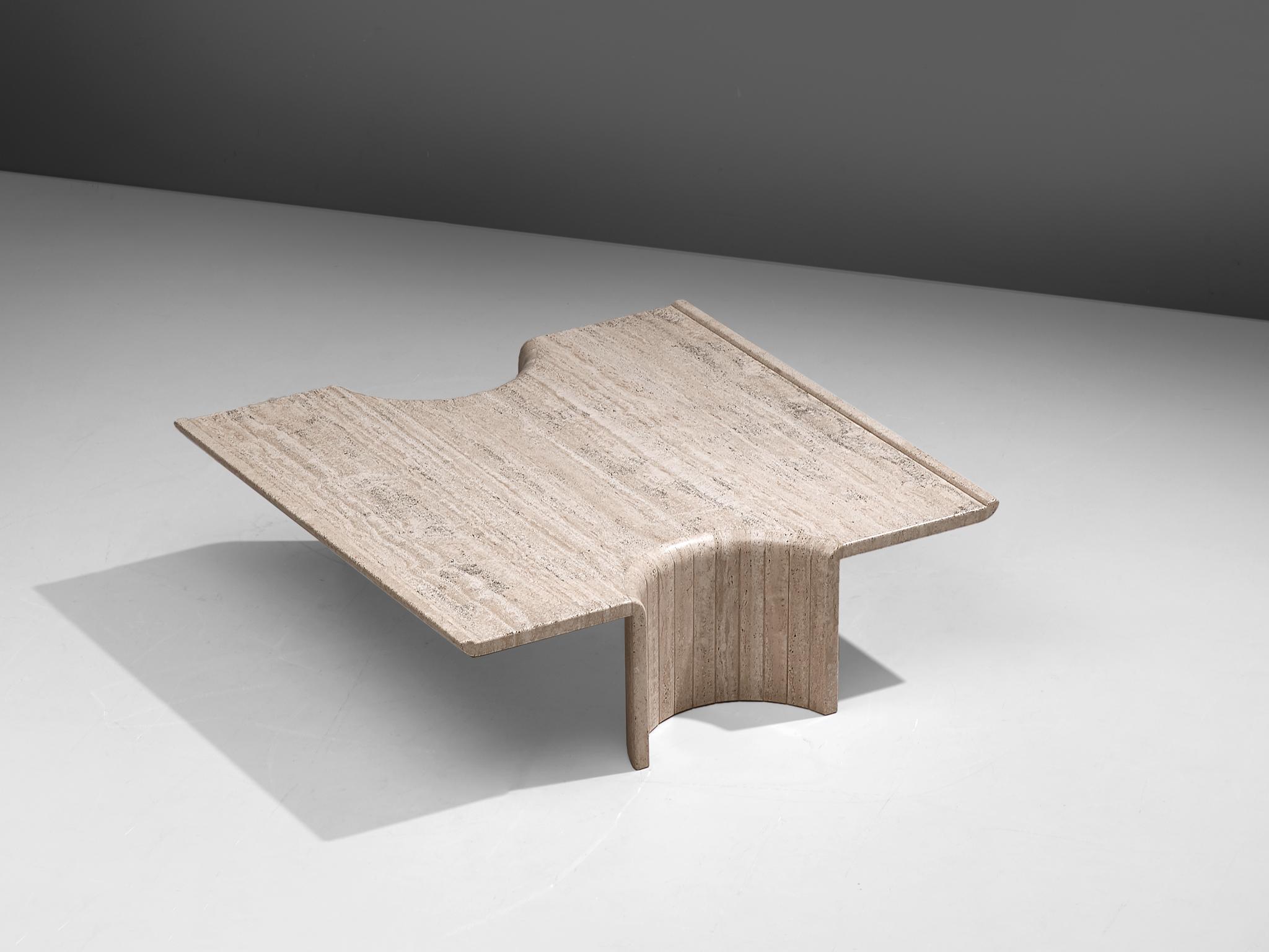 Square coffee table, travertine, Europe, 1970s.

This strong design coffee table features a square table top with half cylindrical legs. The legs are hollow, giving this table an architectural appearance. Special about this this is that fact that