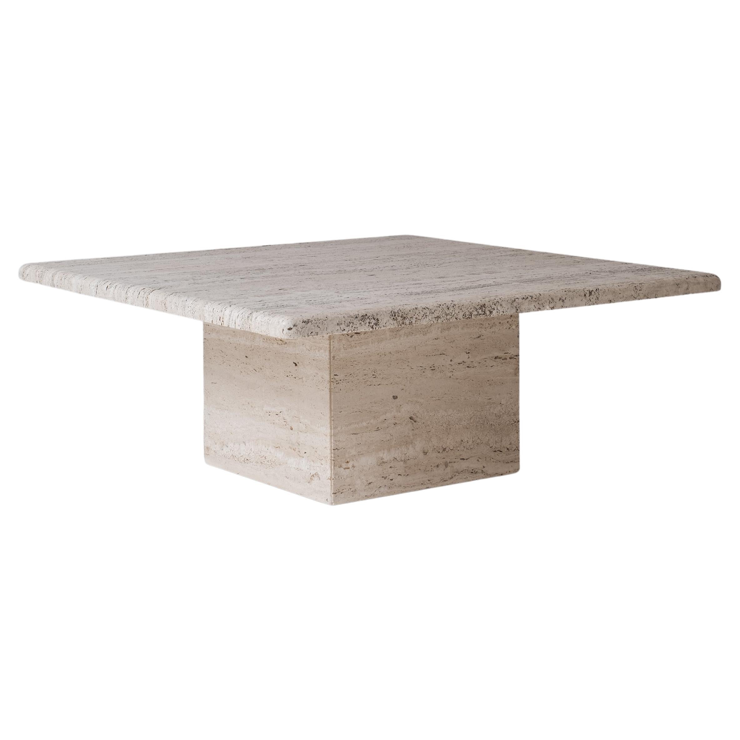 Square coffee table in travertine from the 1970’s. 