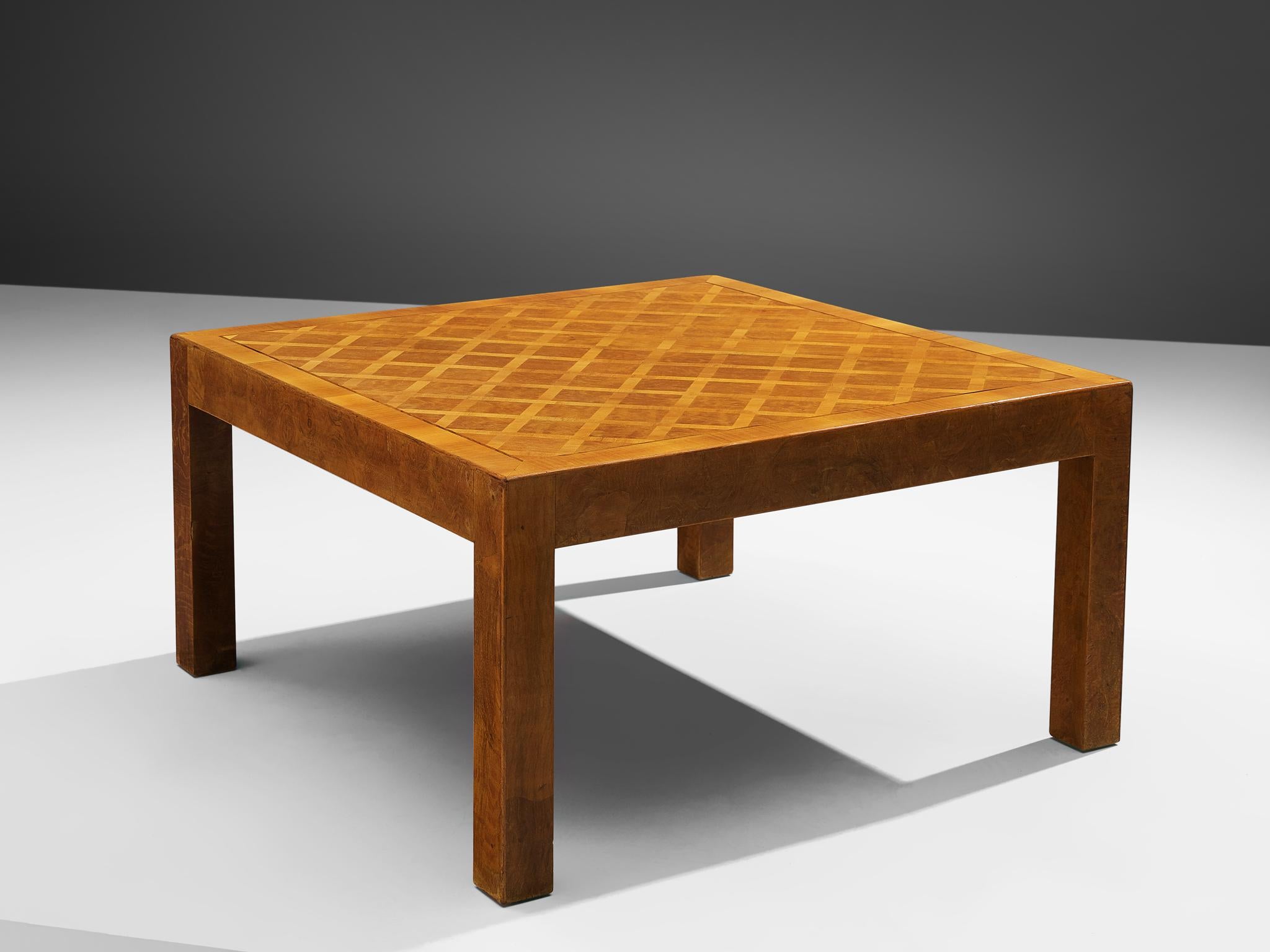Square coffee table, walnut parquetry, Europe, 1960s.

Square coffee table with straight legs in walnut. A clean and geometrical appearance is the result of a modest design. Elegance can be found in the details. The top of this table is inlayed with