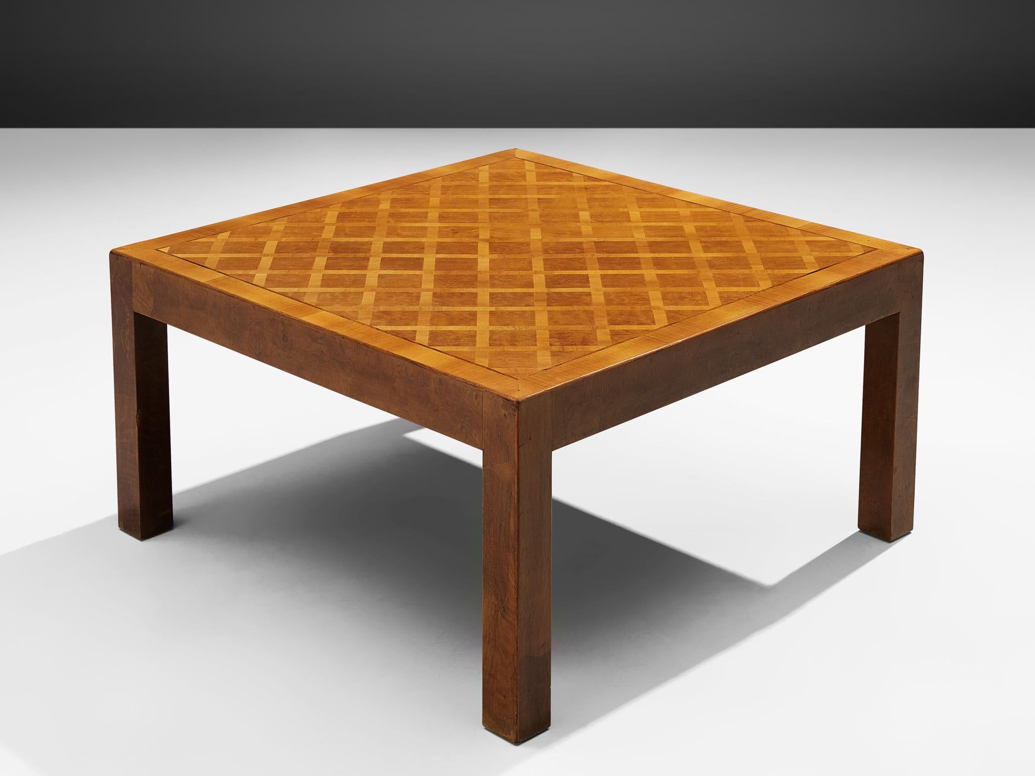Square coffee table, walnut parquetry, The Netherlands, 1940s.

Square coffee table with straight legs in walnut. A clean and geometrical appearance is the result of a modest design. Elegance can be found in the details. The top of this table is