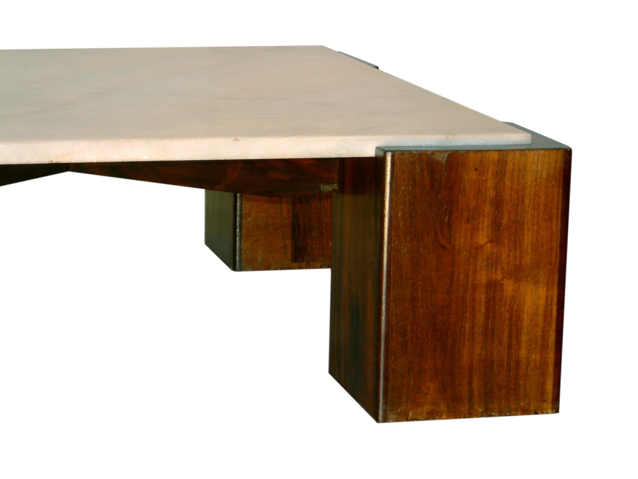 Square coffee table with four rosewood legs and inset marble top, Brazil, 1950s.
 