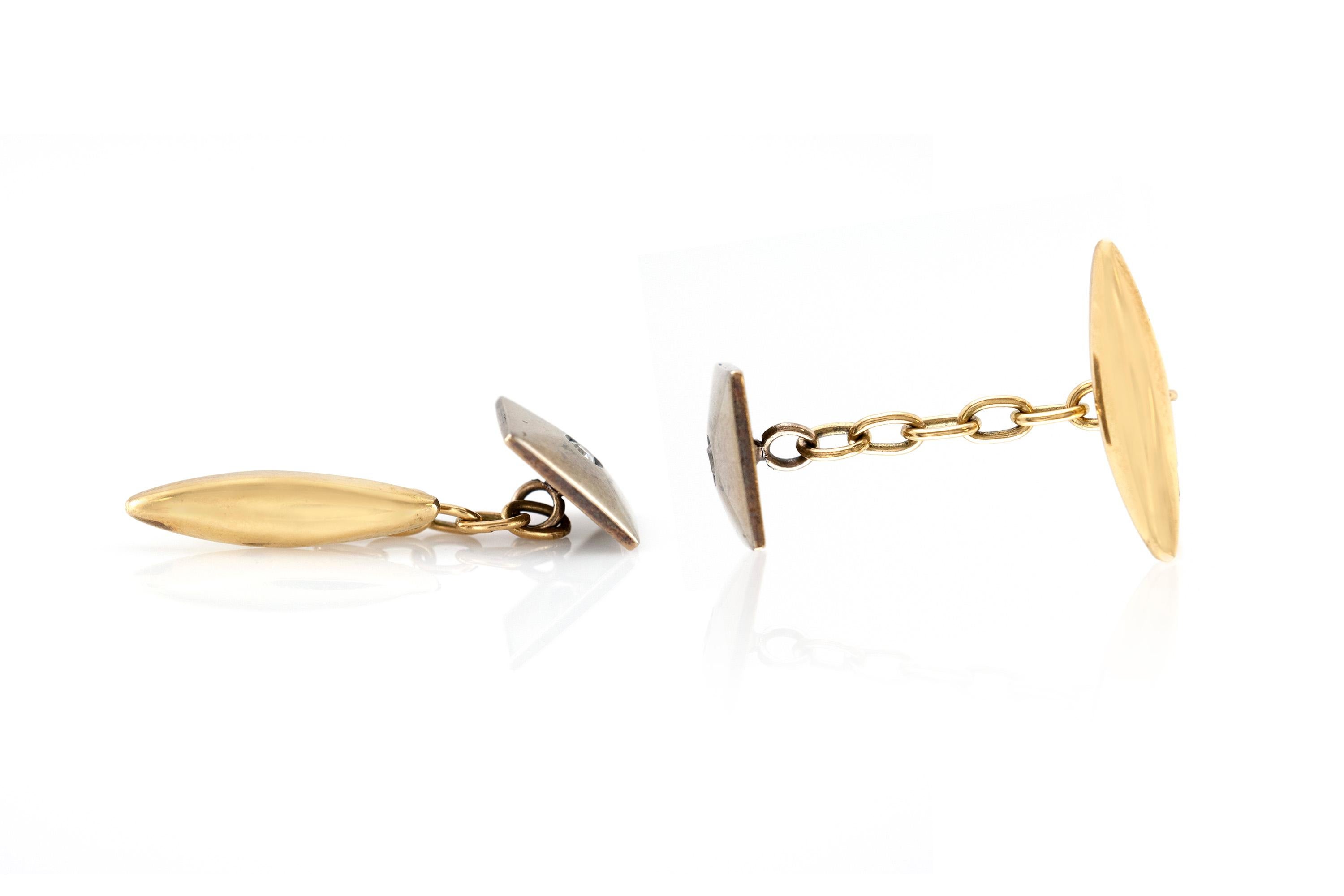 Cufflinks finely crafted in 18k yellow gold weighing a total of 3.2 dwt., with a tiny diamond of weight of 0.18k, size of each cufflink is 0.6 inch. Circa 1980.