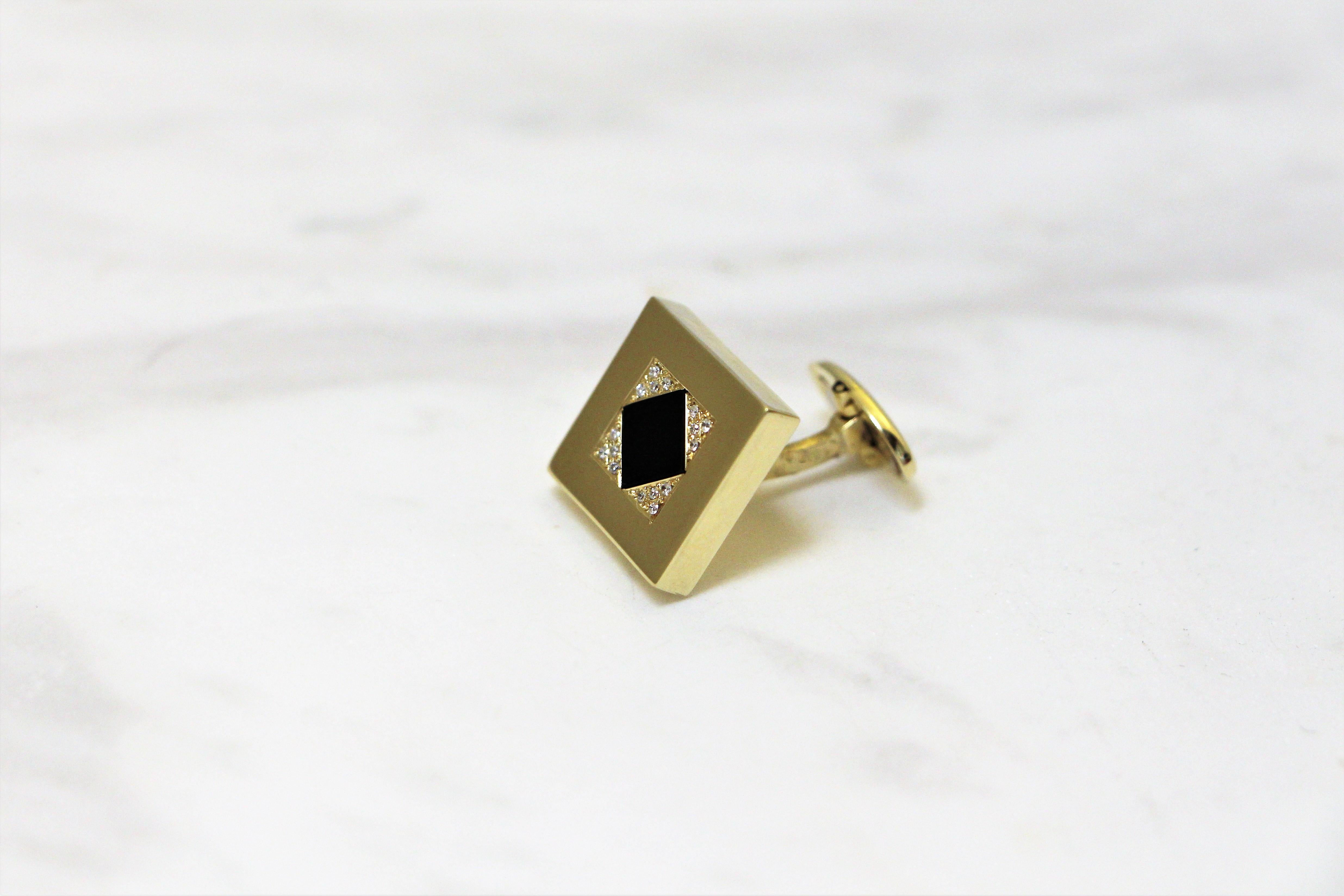 Square cufflinks handcrafted in 14Kt yellow gold featuring a rhombus black onyx centre and brilliant cut diamonds. The brilliant diamonds and the black onyx create a mesmerising play between light and shadow. These Cufflinks belong to Metalloplasies