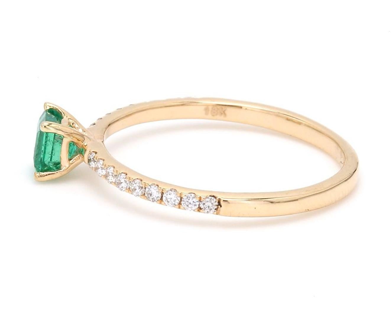 A Beautiful Handcrafted Ring in 18 Karat Yellow Gold  with Natural Emerald in Square Cut and Diamonds on Shank. A perfect Ring for occasion

 Emerald Details
Pieces : 1 Pieces Square Cut 
Weight : 0.32 Carat 
AAA Quality Emerald

Natural Diamond