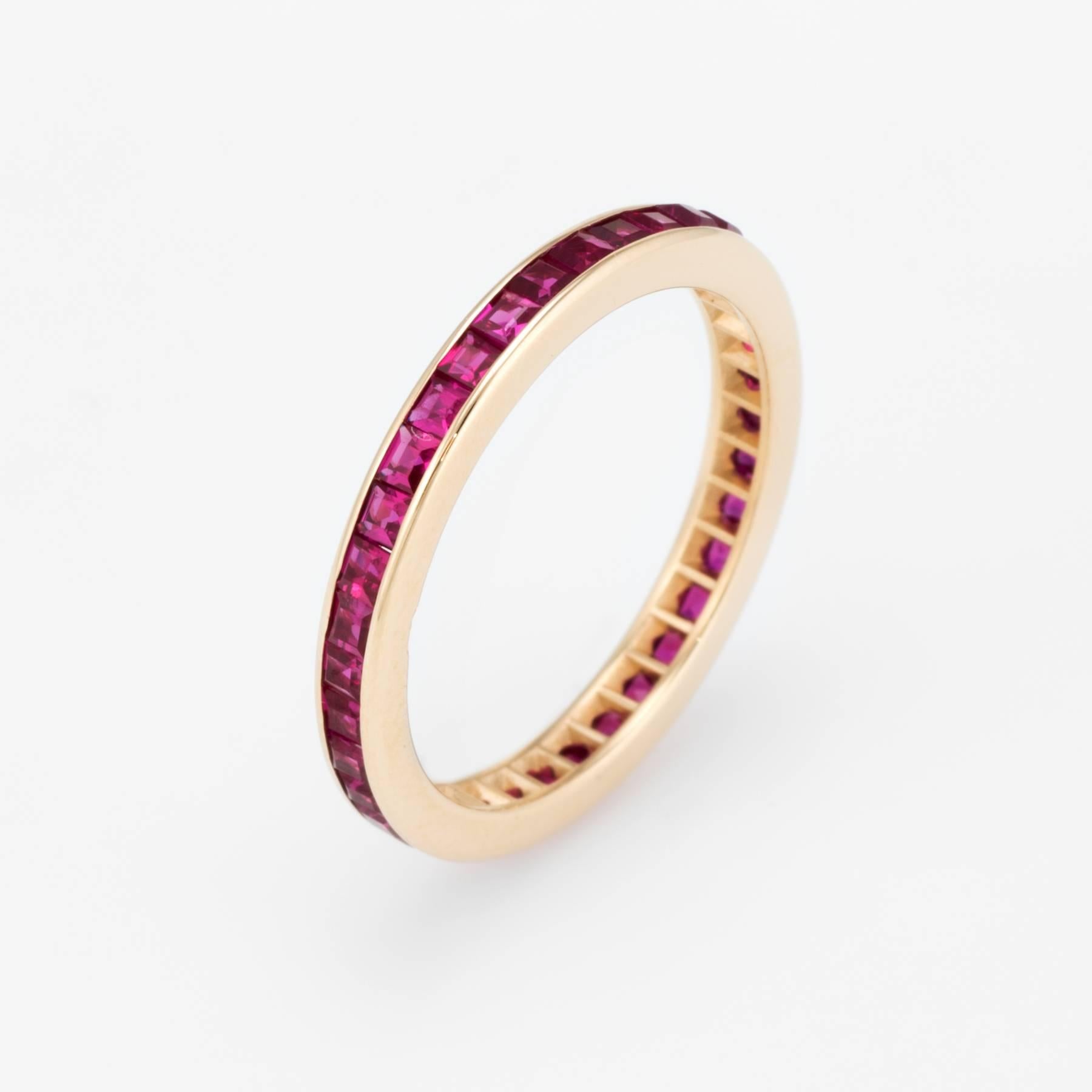 Elegant estate eternity ring, crafted in 14 karat yellow gold. 

Square cut rubies are estimated at 0.03 carats each and total an estimated 1.11 carats. The rubies are in excellent condition and free of cracks or chips.   

The ring is in excellent
