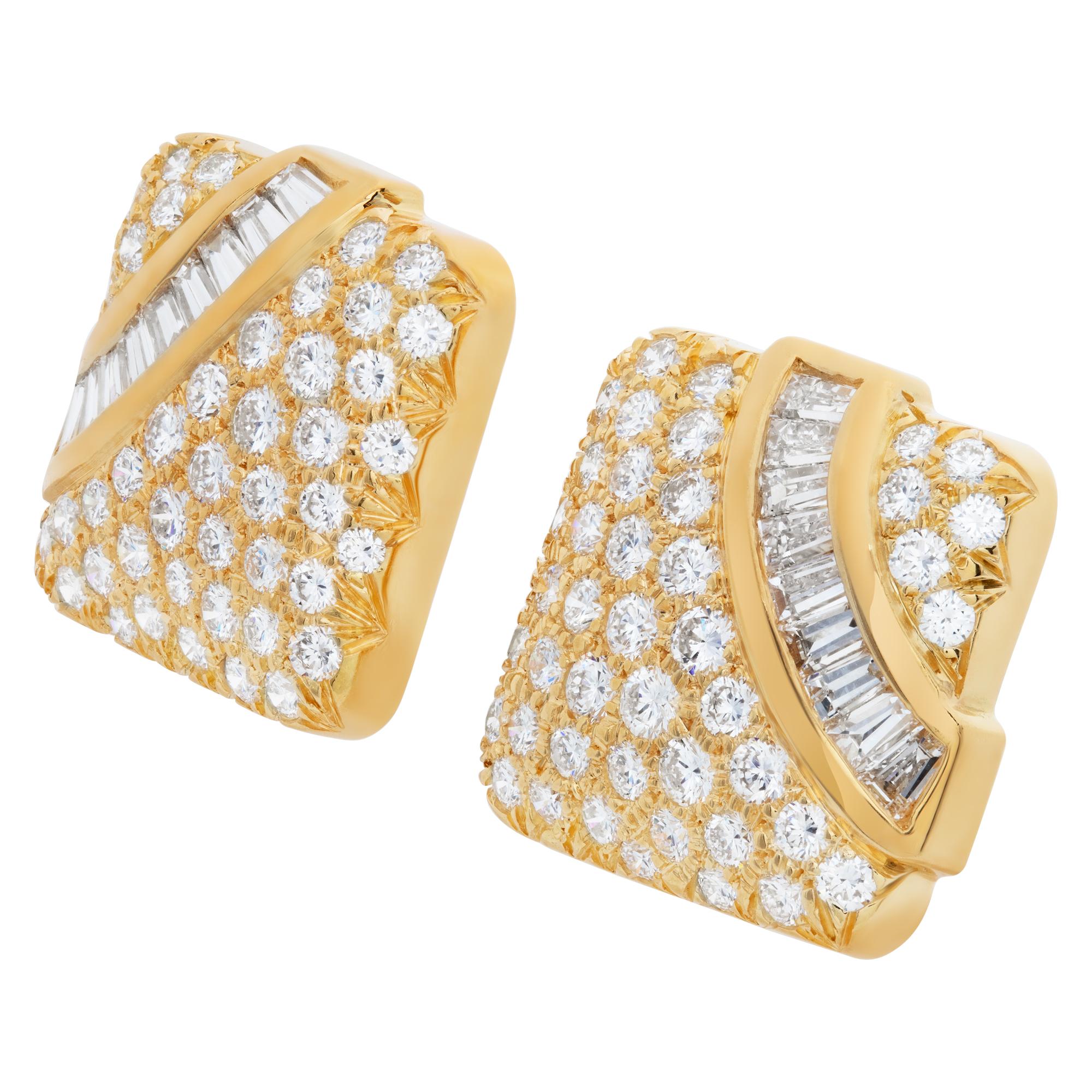 Square diamond clip on earrings in 18k with approximately over 5 carats in F-G color, VVS-VS clarity round diamonds and over 1 carat in baguette F-G color, VVS-VS clarity diamonds. Length 0.80 inches.
