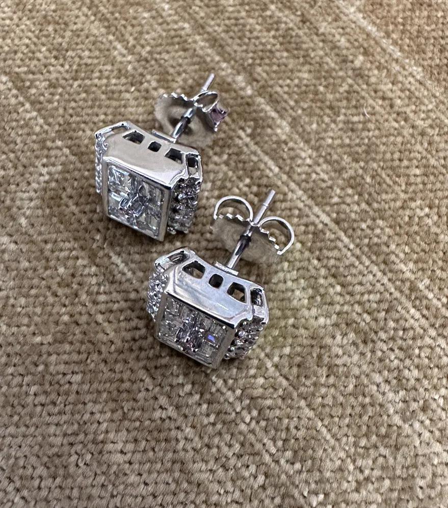 Square Diamond Illusion Earrings with Baguettes and Rounds and center Pink Diamond in Platinum 

Diamond Earrings feature a Natural Pink Diamond in the center, accented by a cluster of Baguette Diamonds and Round Brilliant Diamonds illusion-set in