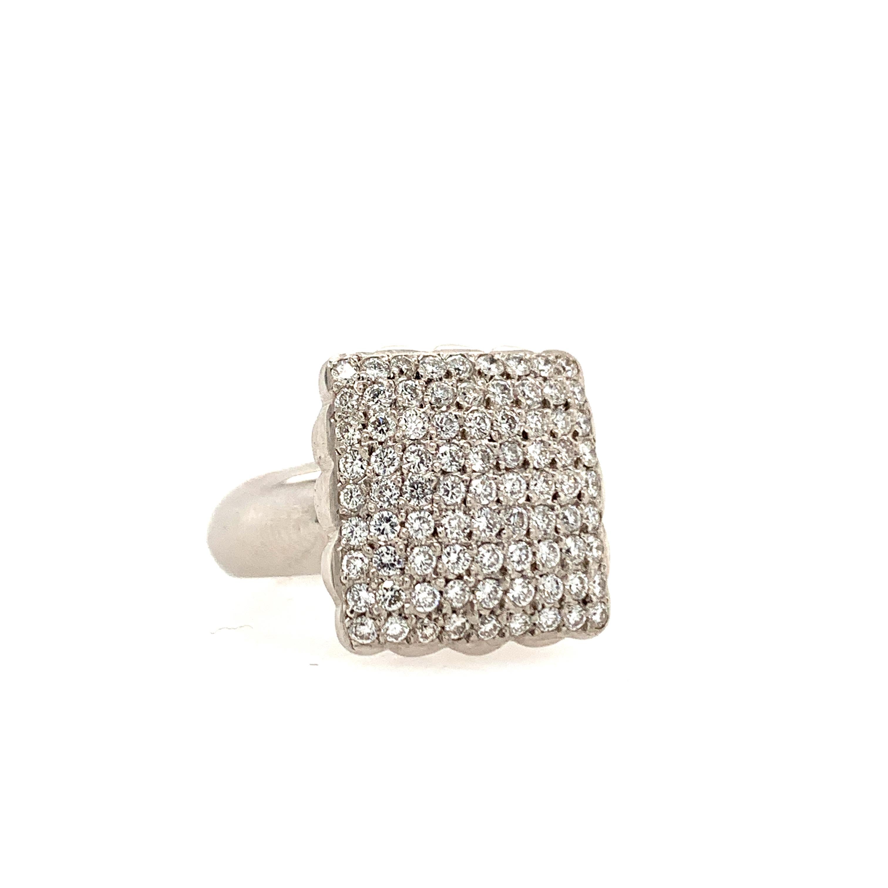 This beautiful ring is handmade and flaunts round brilliant diamonds pave-set for a total carat weight of 1.20 carat. 

Set in 18K white gold.

1.20 total carat weight.

Size 6.5 (can be resized free of charge).