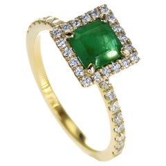 Square Emerald and diamonds halo classic ring