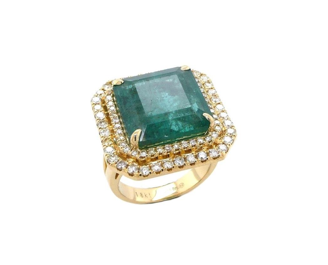 Square Emerald Diamond Halo Statement Unique Luxury Vintage Yellow Gold Ring
18 Karat Yellow Gold
Genuine Emerald & Natural Diamonds
14.00 CT Emerald Square Shape 
2.00 CTW Diamonds
Current Regular Size 7 – Resizable upon request
Designed & Handmade