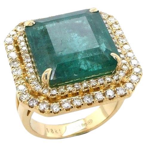 Bague de luxe vintage unique en or jaune avec halo de diamants et émeraudes carrées