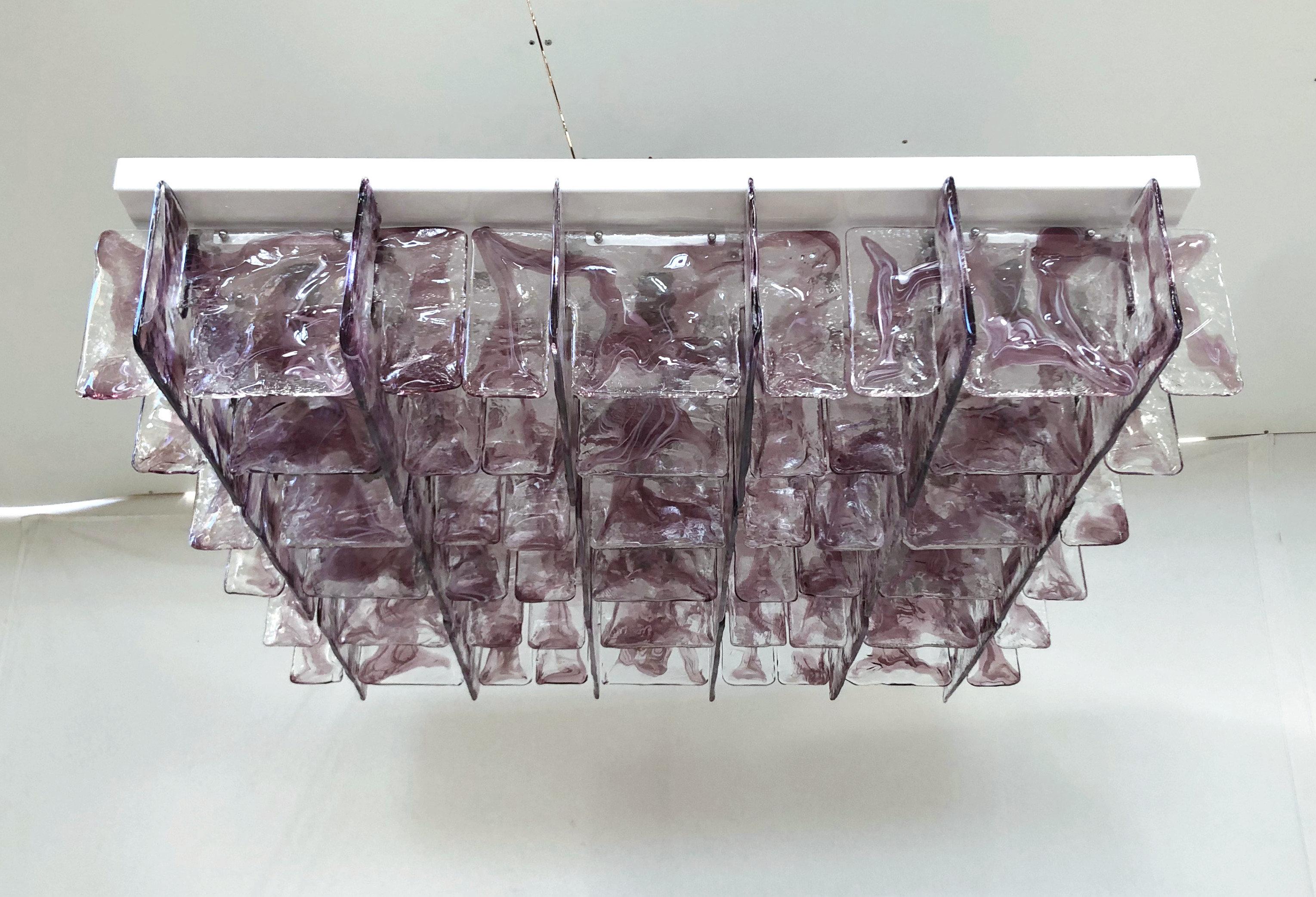 Italian flushmount with hand blown clear and amethyst Murano glass panels mounted on white metal frame with chrome hardware / Designed by Fabio Bergomi for Fabio Ltd, in the style of Mazzega / Made in Italy
9 lights / E26 or E27 type / max 60W