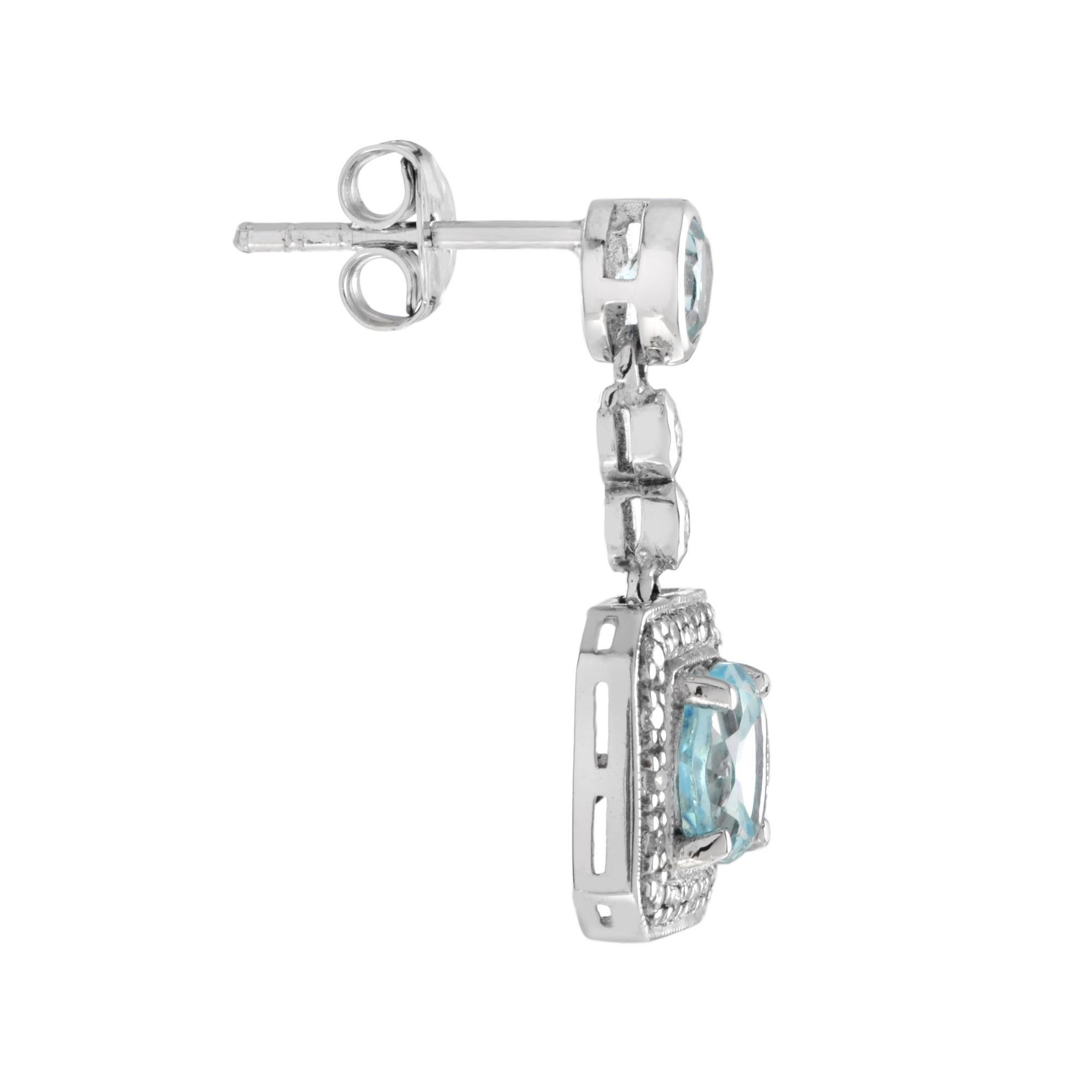 Dainty round cut sky blue topaz are framed by tiny diamond on square frame in 14k gold. Pretty earrings for bridesmaids and great for brides looking for square shape earrings and need it simple. The earrings can be used on every occasion and daily