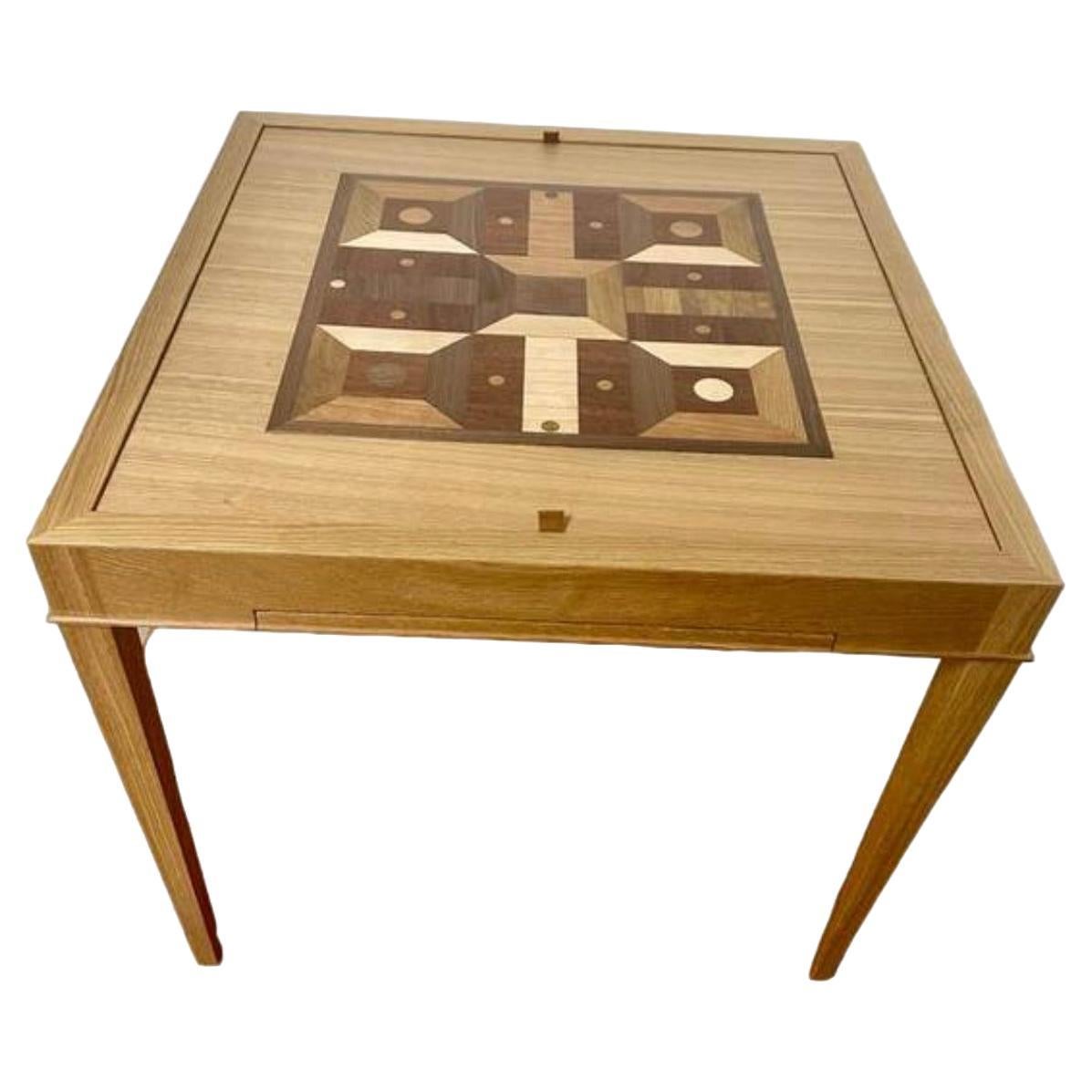 Custom walnut or mahogany table with removable top that exposes the backgammon board. The top can be flipped over to expose the chess board. Perfect size to play cards, poker, board games etc. The marquetry is integrated into the top. Can be made in