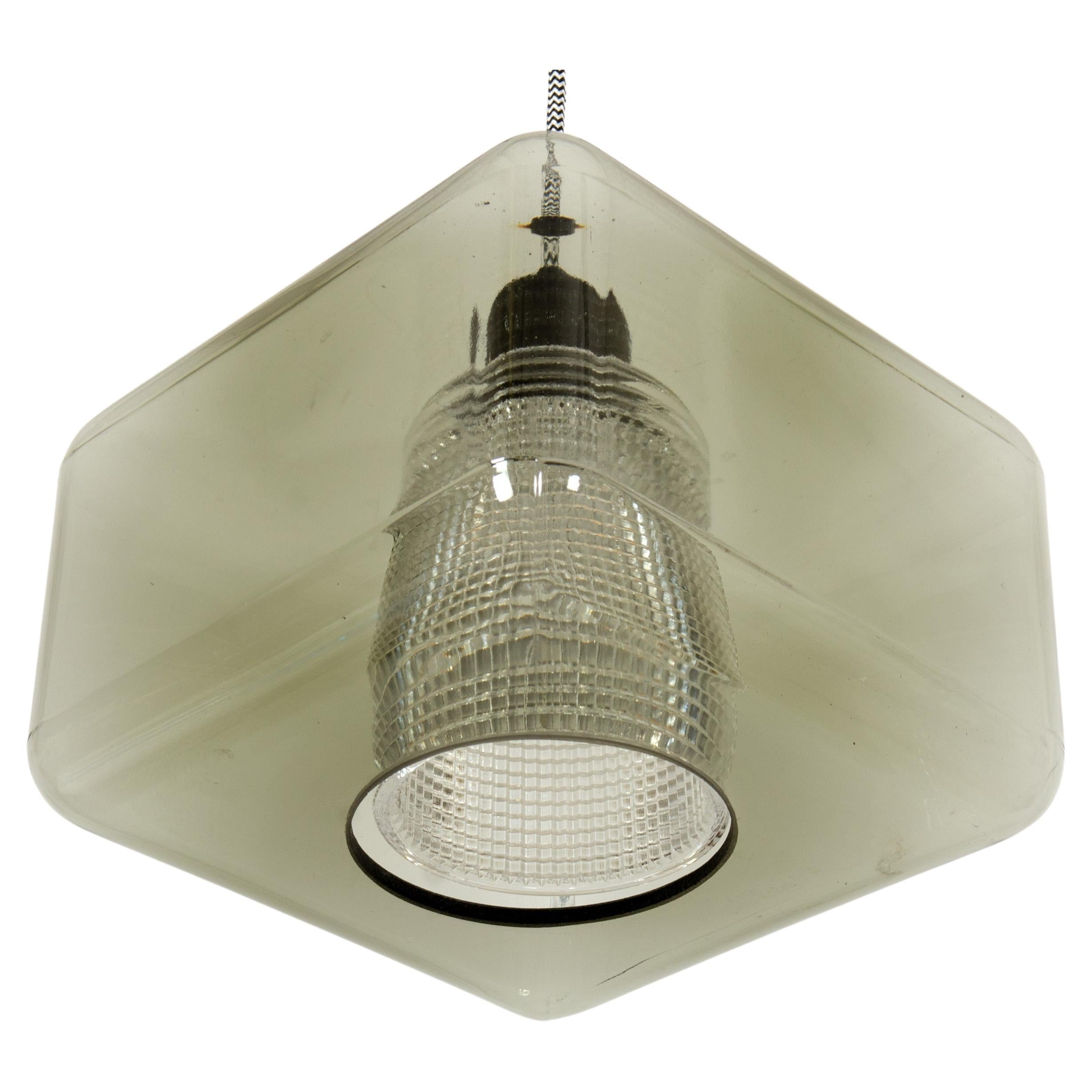 Square shaped glass and clear glass (inside) pendant lamp. Designed in the 1960s by Carl Fagerlund for  Orrefors Glassworks in Sweden. Light grey tinted glass outer cup with a cylinder internal diffuser in clear pressed glass. 
Rewired. Very good