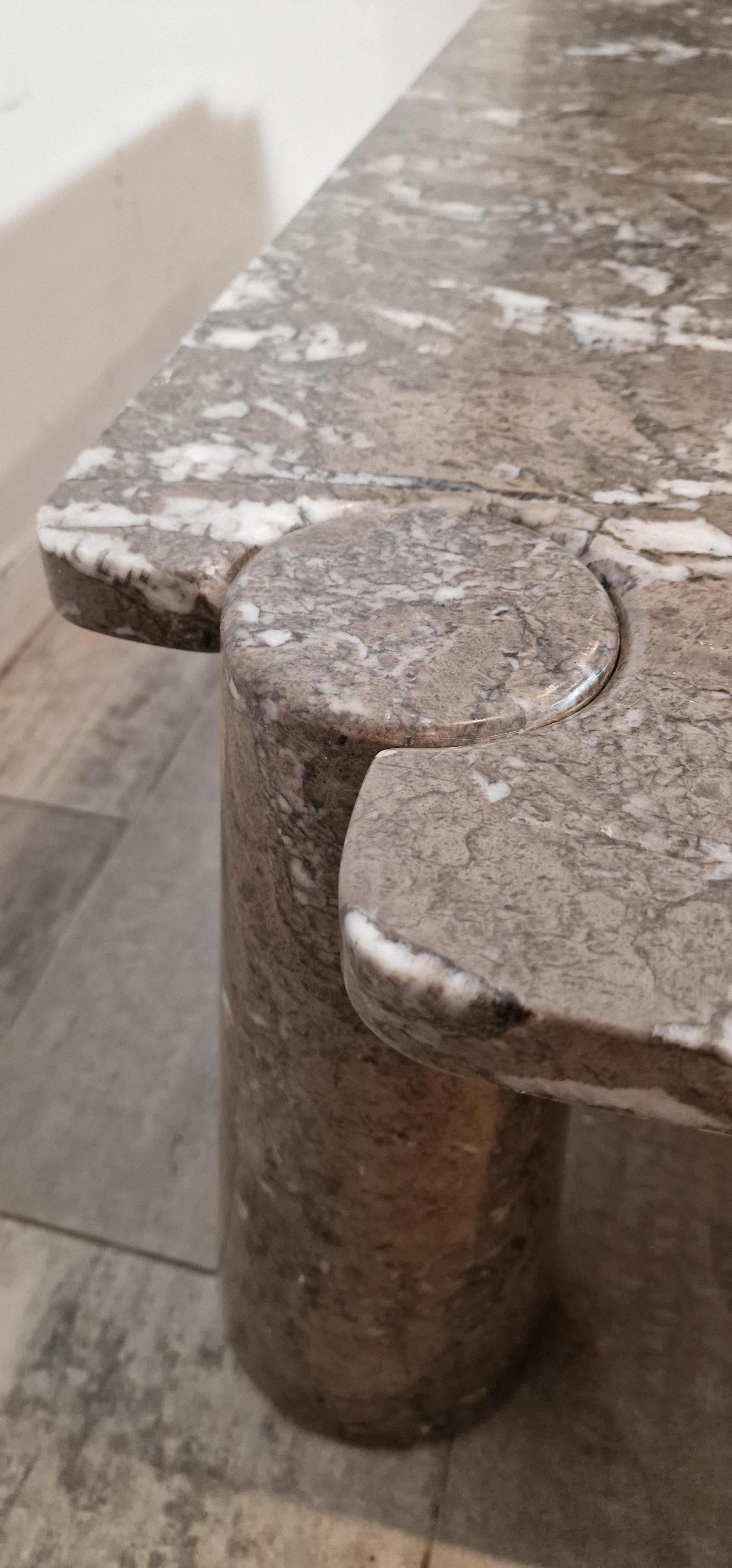 Square grey marble coffee table and scale form Angelo Mangiarotti.