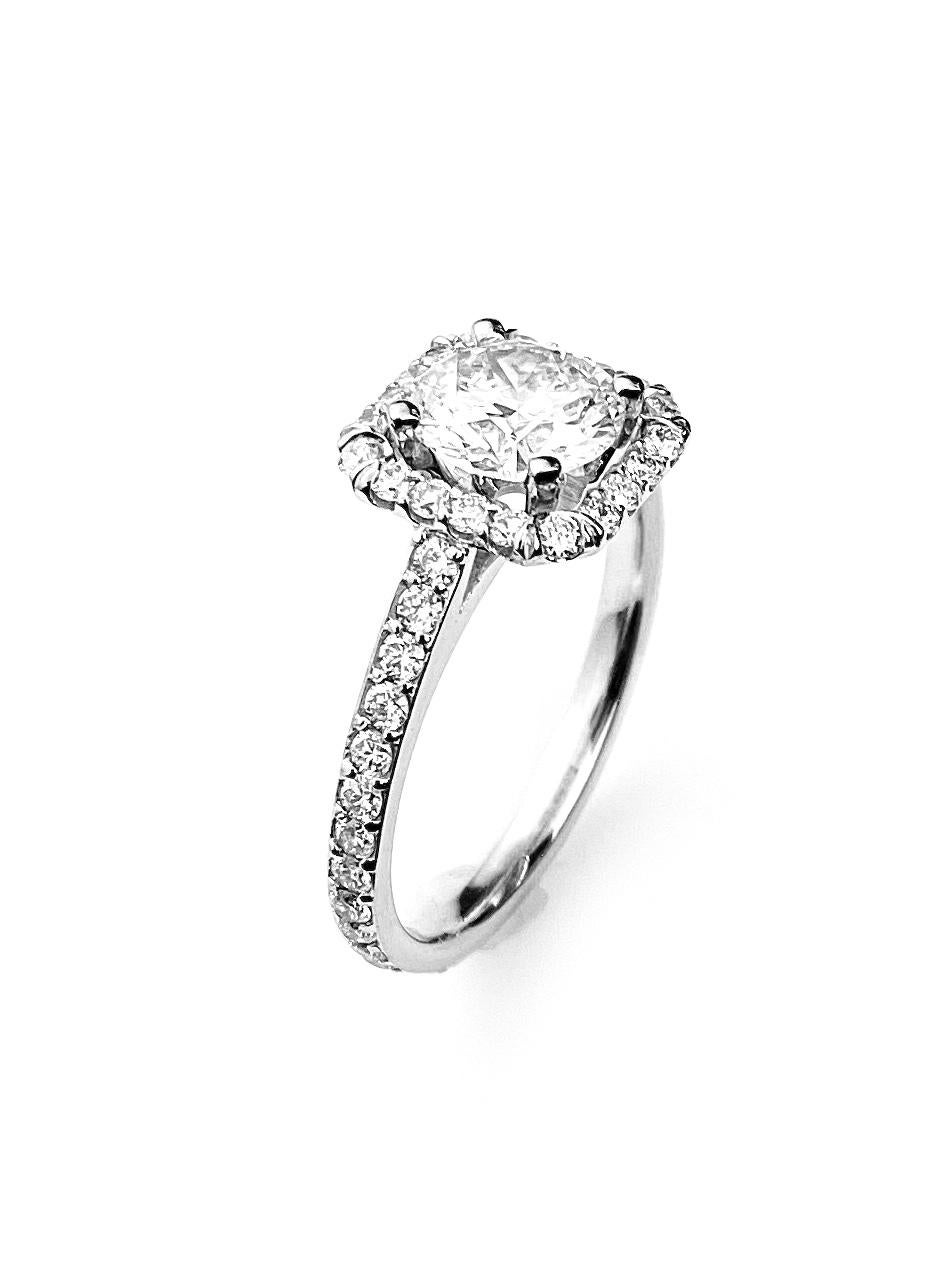 Contemporary Square Halo Engagement Ring with Round Cut Center Diamond in White Gold For Sale
