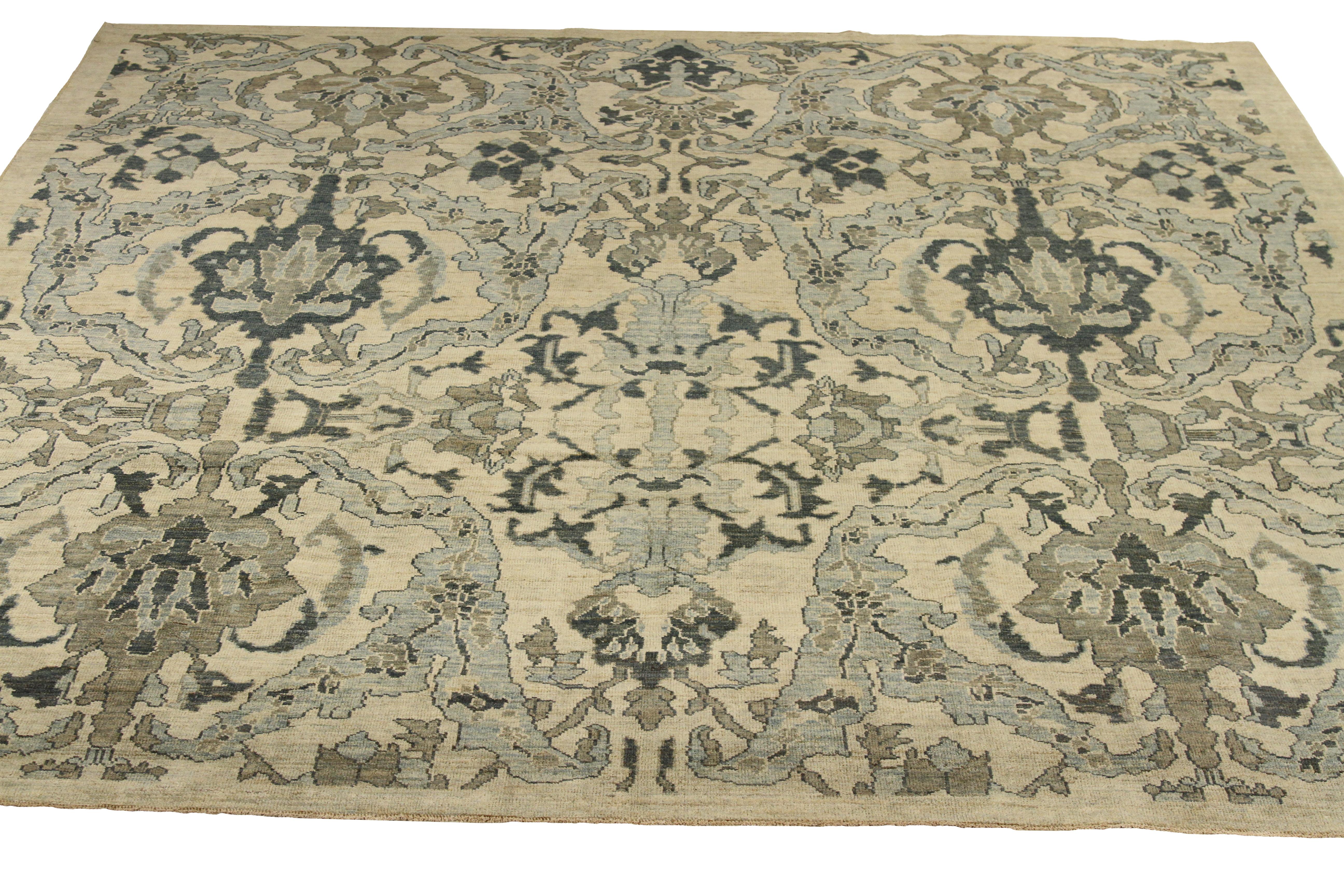 Modern hand-woven Persian area rug made from fine wool and all-natural vegetable dyes that are safe for people and pets. This beautiful piece features a rich field of floral details in various colors which is the traditional weaving design of